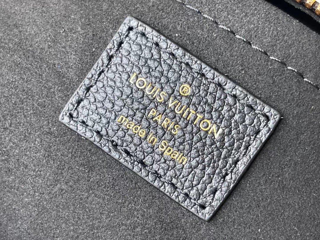 This Speedy Bandoulière 20 handbag is crafted from Monogram Empreinte - Bag 9