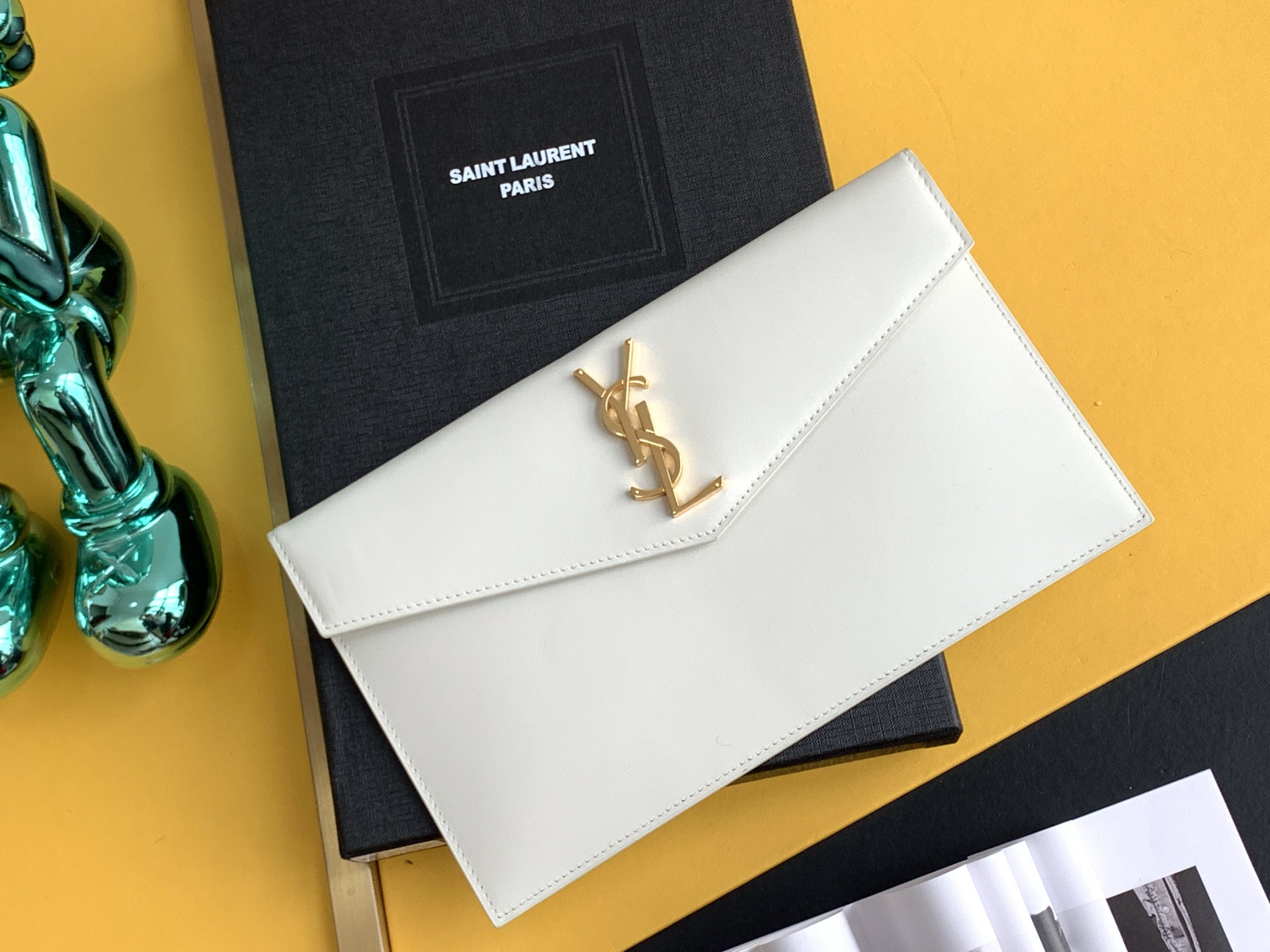 YSL Uptown Clutch Metallic Logo Calfskin