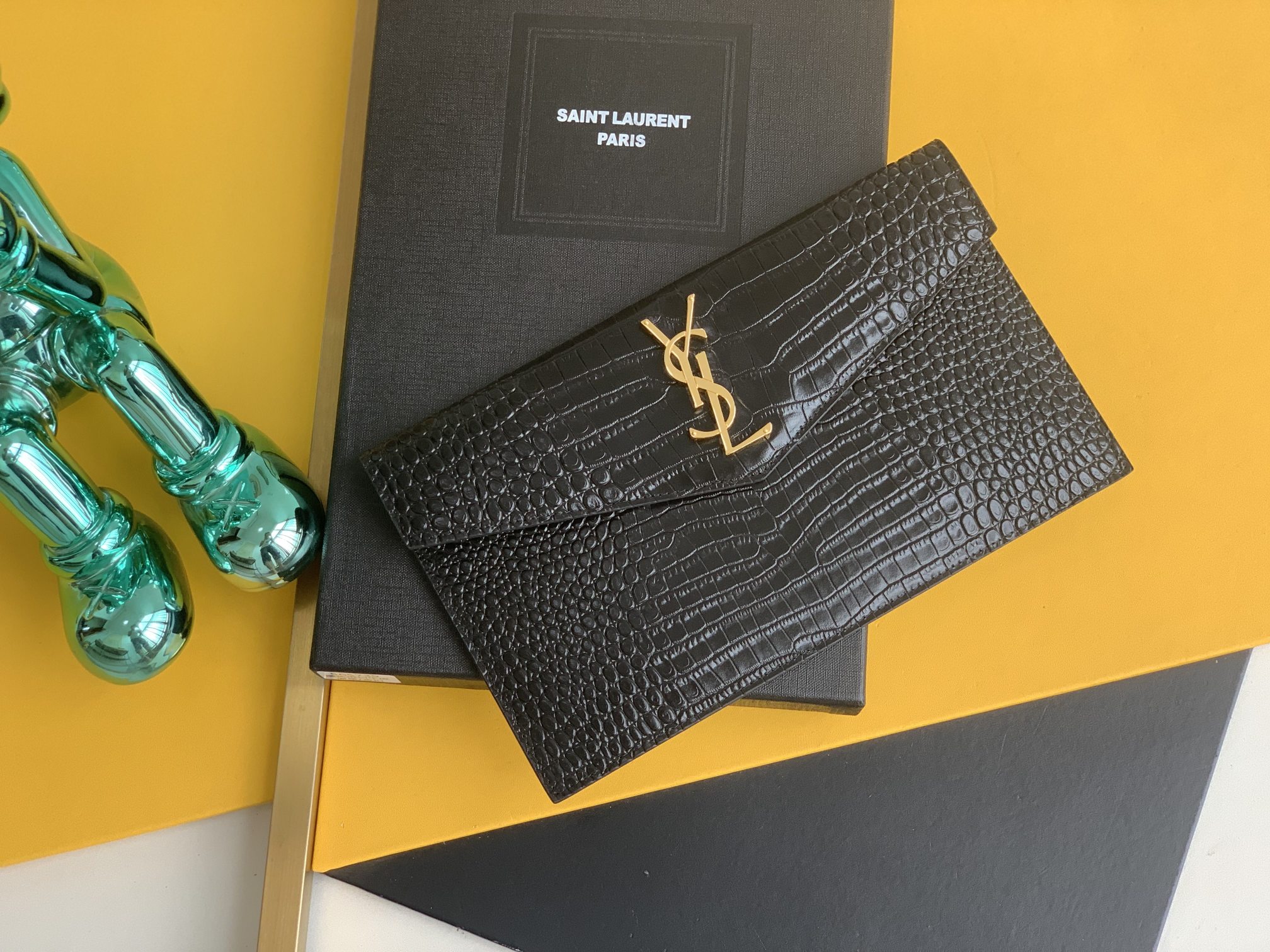 YSL metal logo calf leather clutch bag