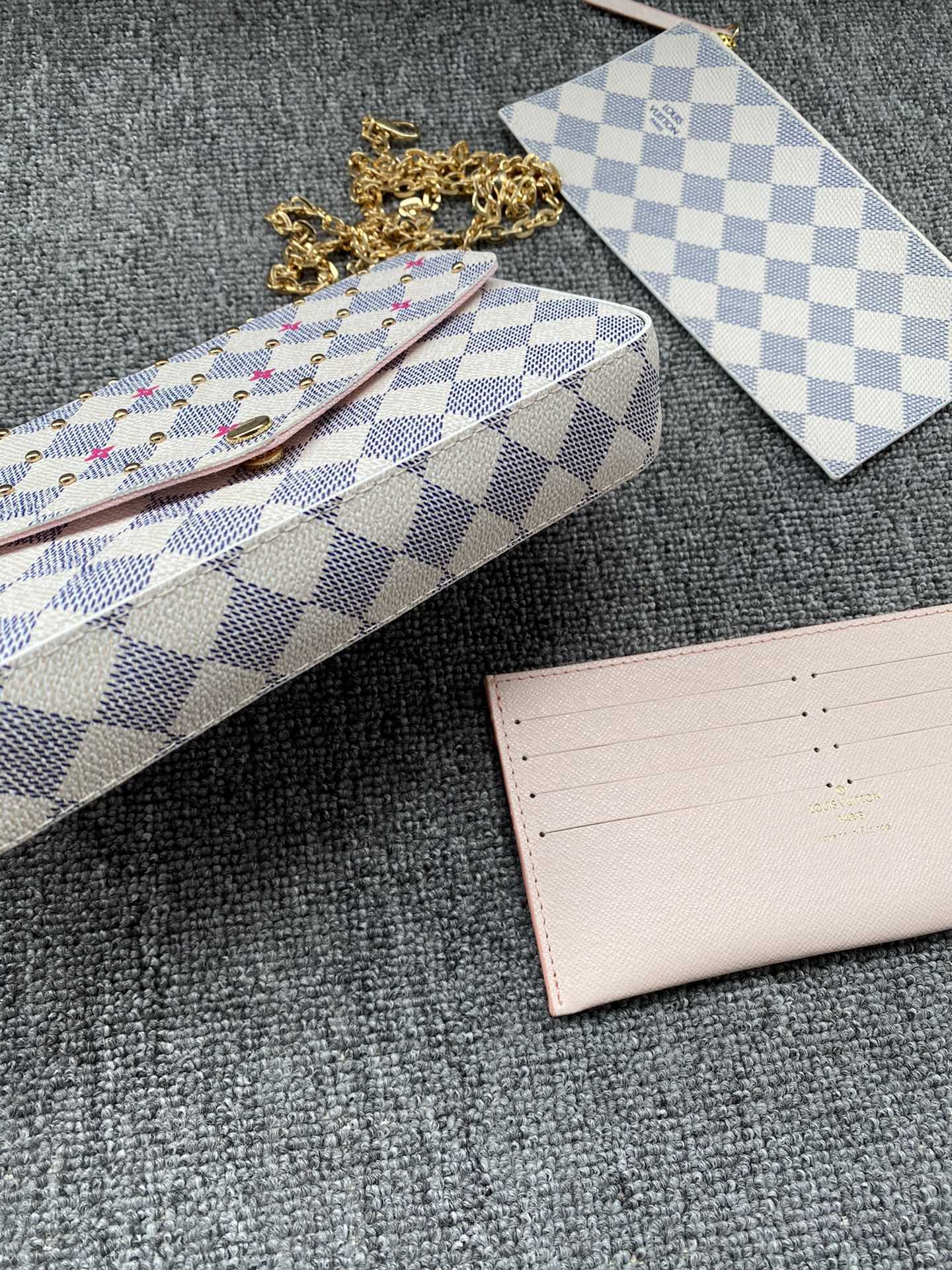 Leather chain wallet used as shoulder bag