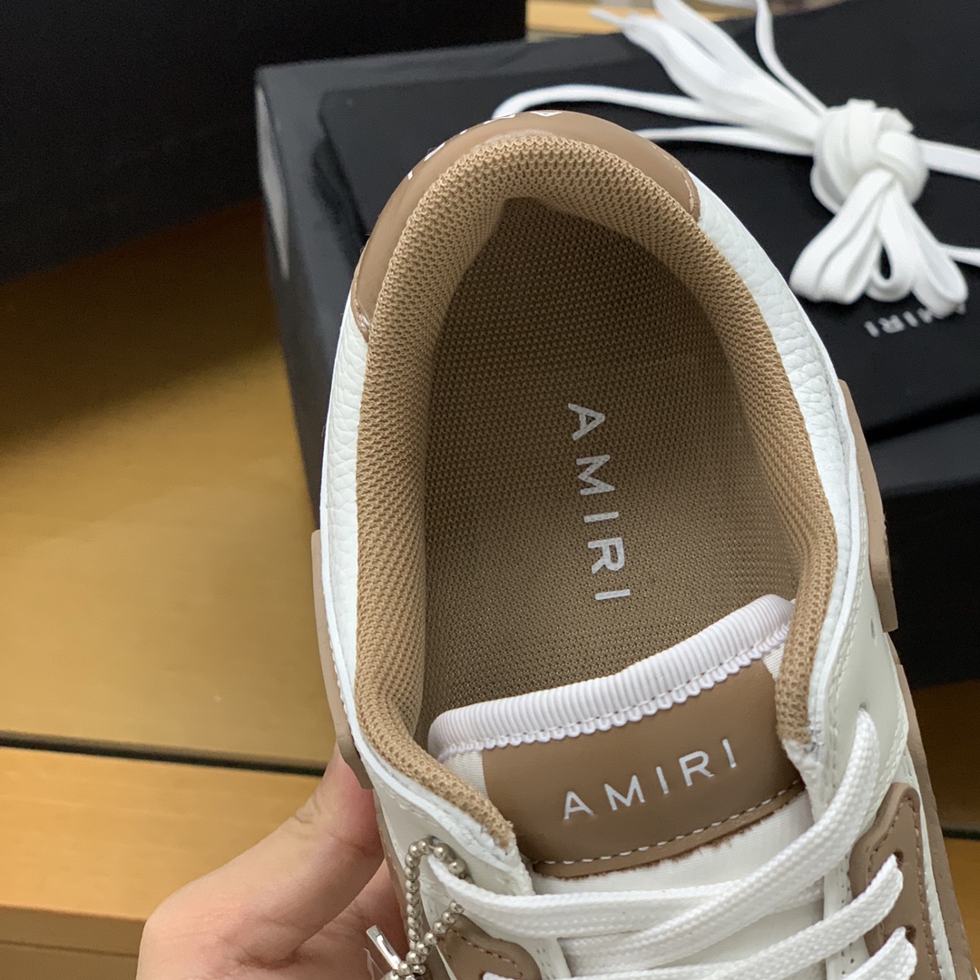 Amiri    此款采用牛皮制成骨头情侣款运动鞋