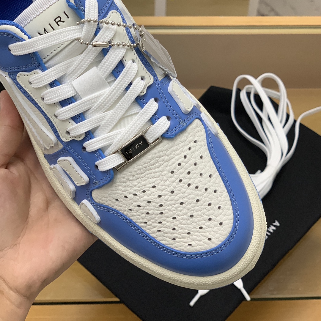 Amiri 此款采用牛皮制成骨头情侣款运动鞋