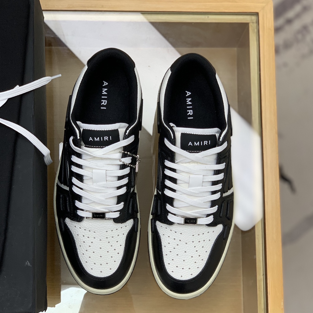Amiri 此款采用牛皮制成骨头情侣款运动鞋