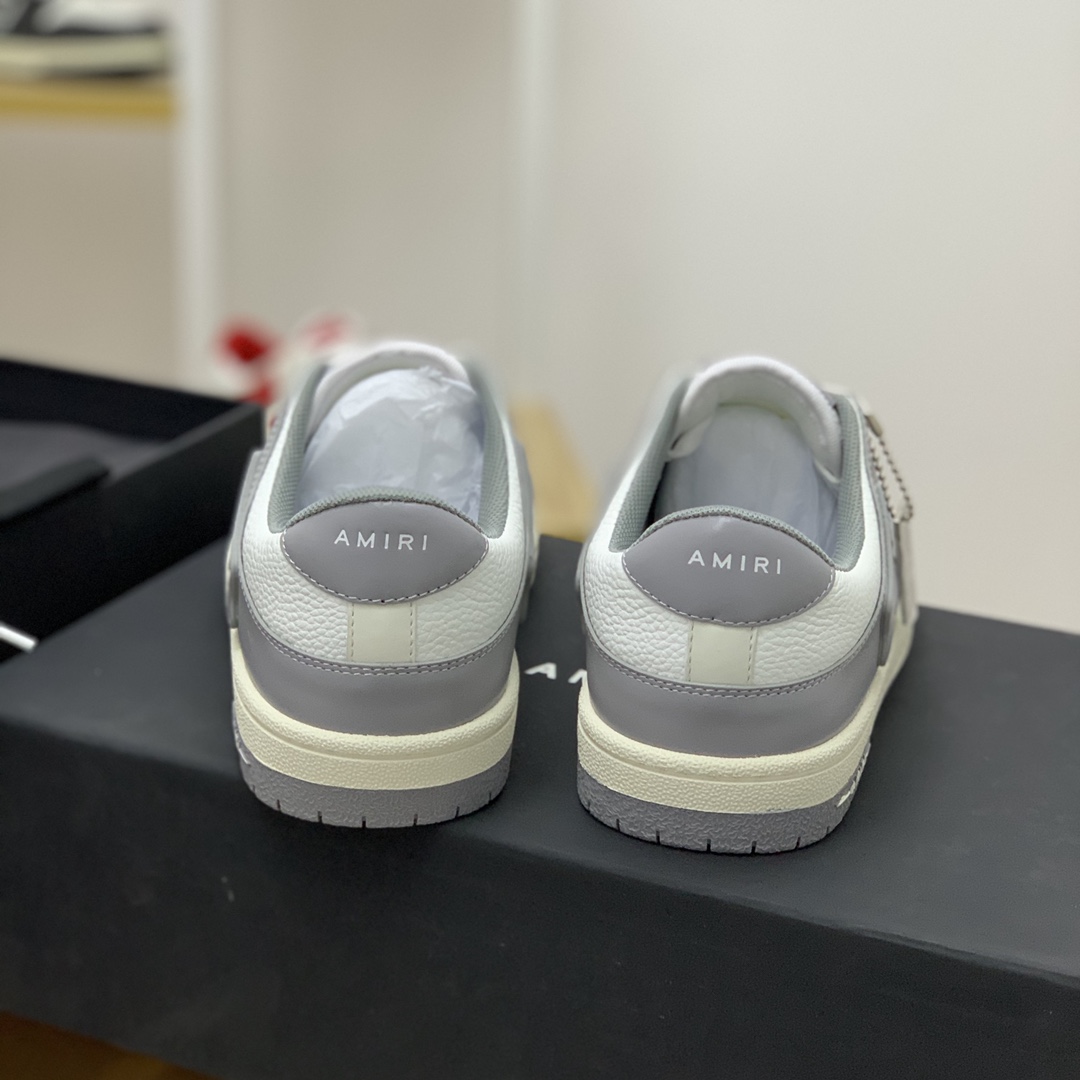 Amiri 此款采用牛皮制成骨头情侣款运动鞋