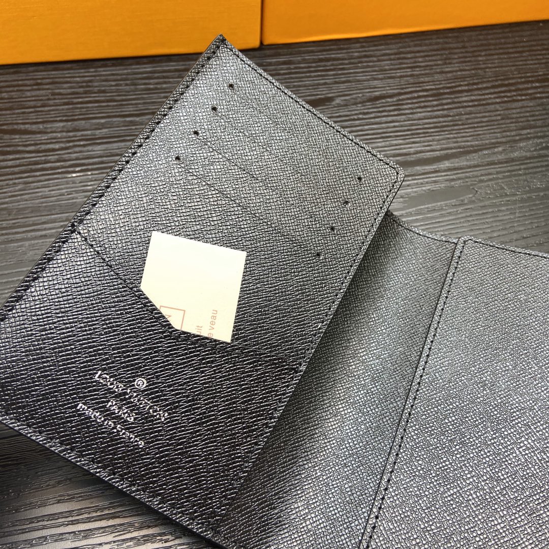 Passport wallet in gift packaging.