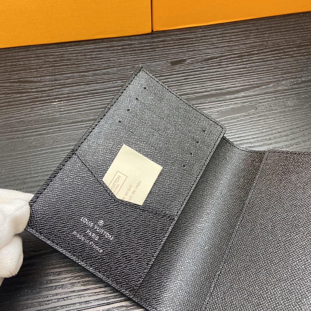 Passport cover in hand