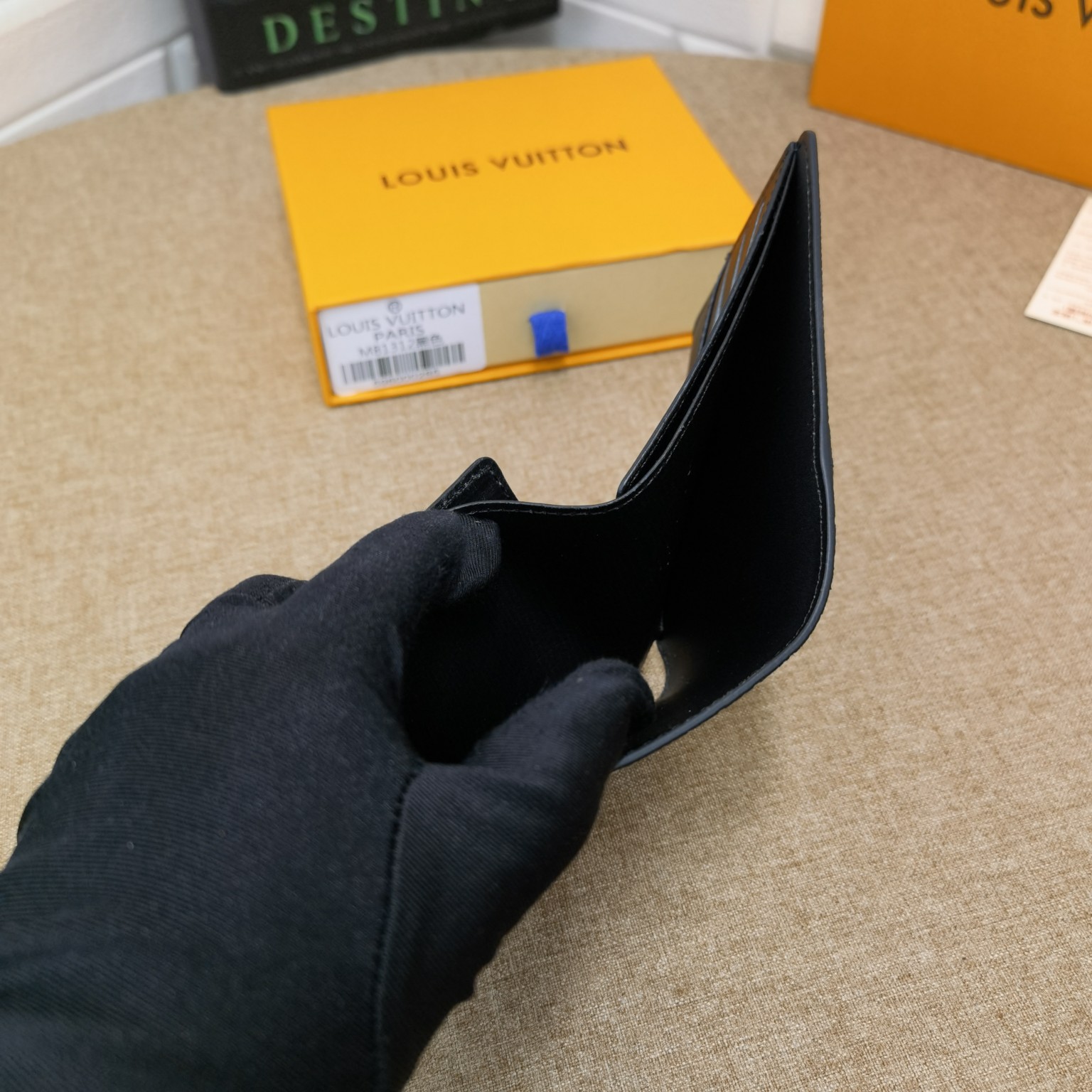 Leather Bifold Wallet - next to a credit card for size comparison