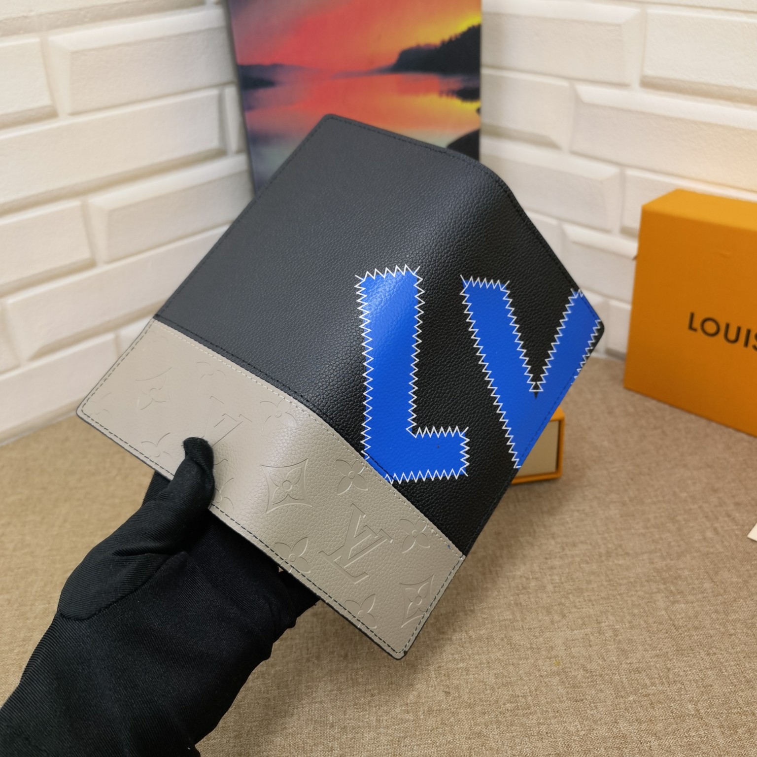 Bifold wallet detail of logo