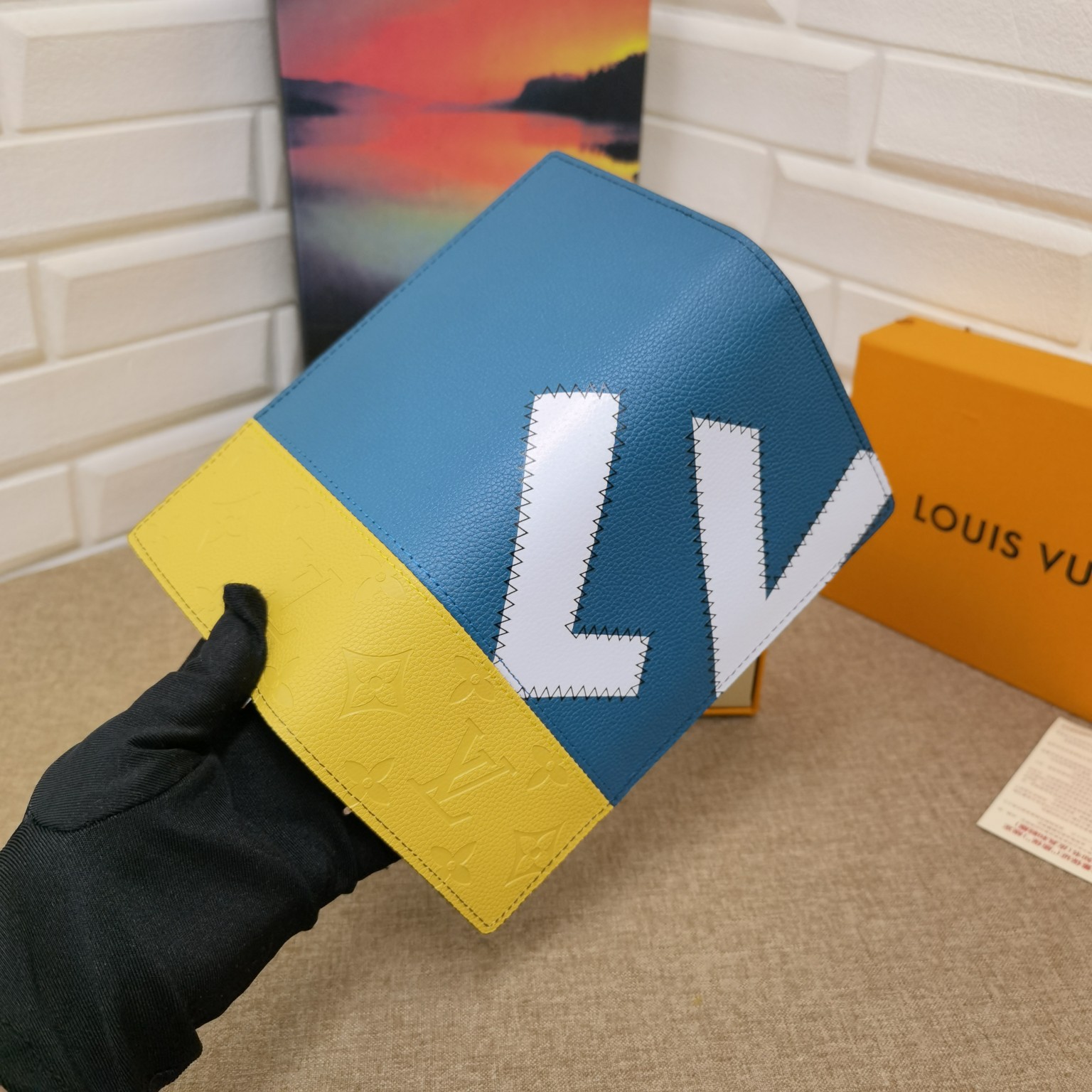 Bifold wallet detail of logo