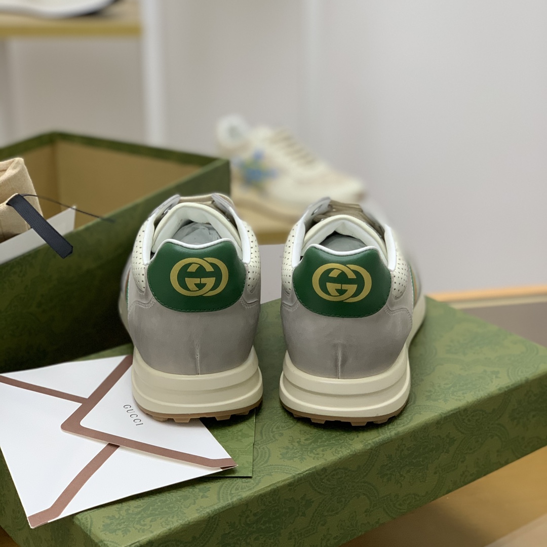GUCCI古驰   采用牛皮，以红绿织带男士运动跑鞋