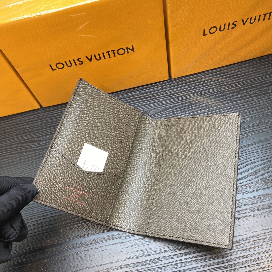 Passport cover with an added pen