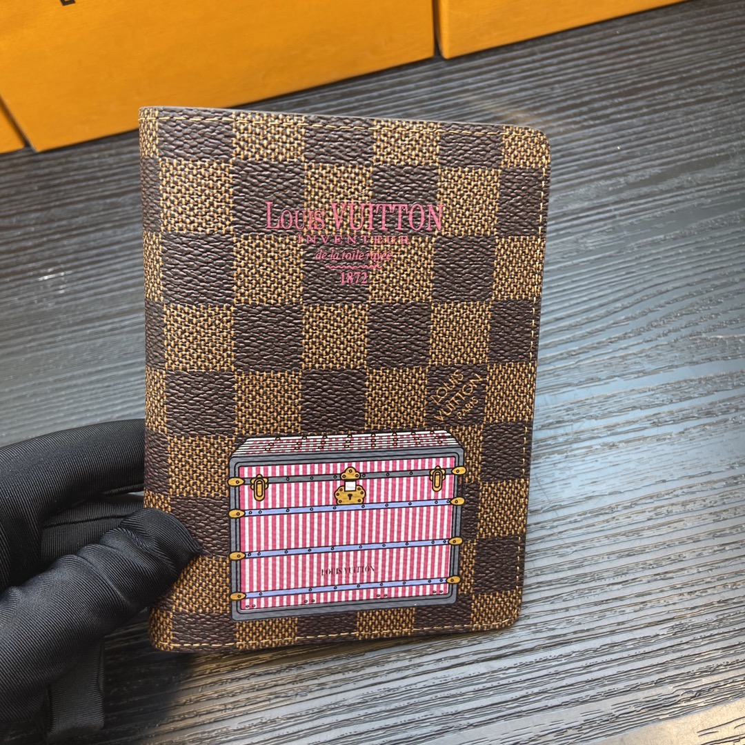 Person using a classic leather passport wallet
