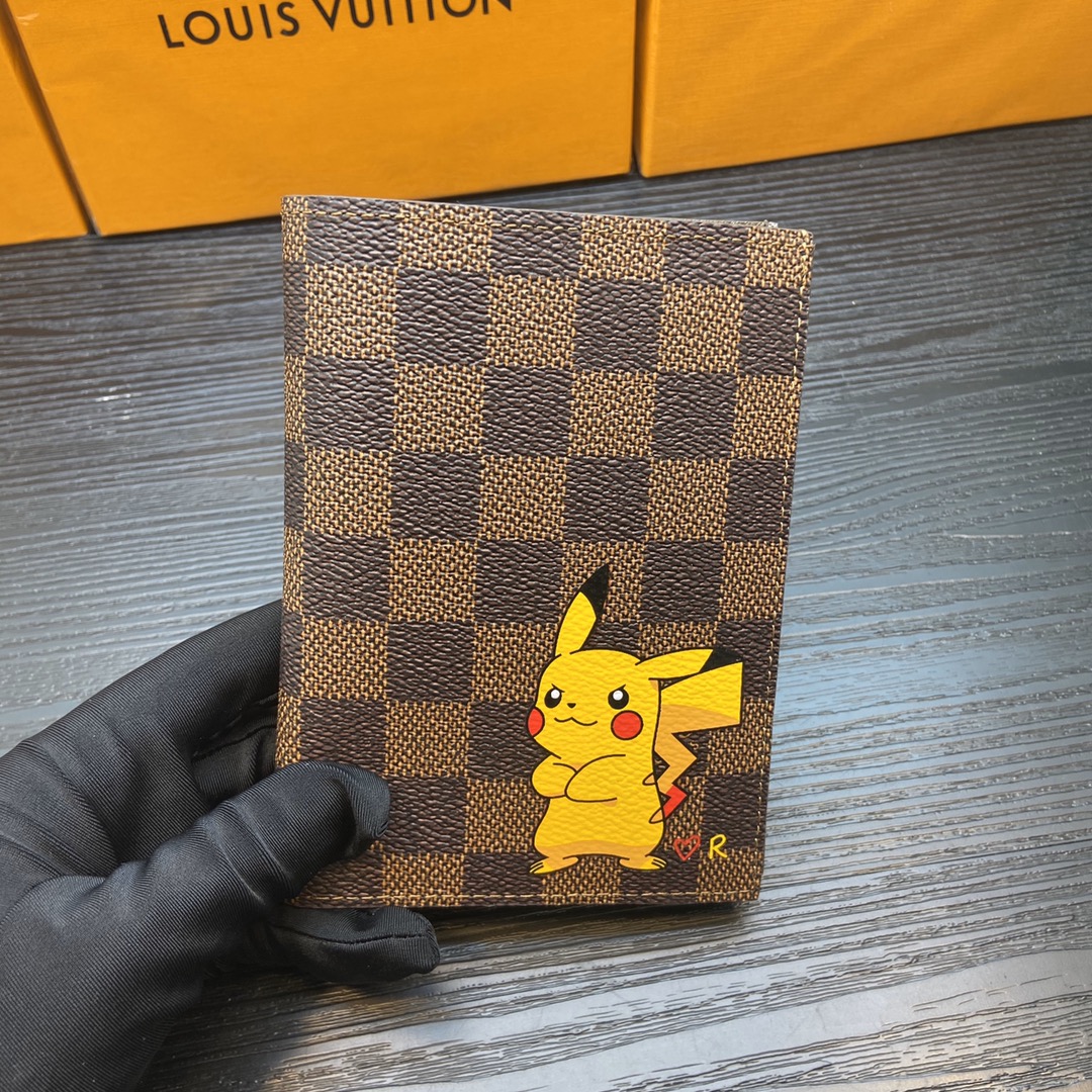 Traveler using a luxury leather passport cover.