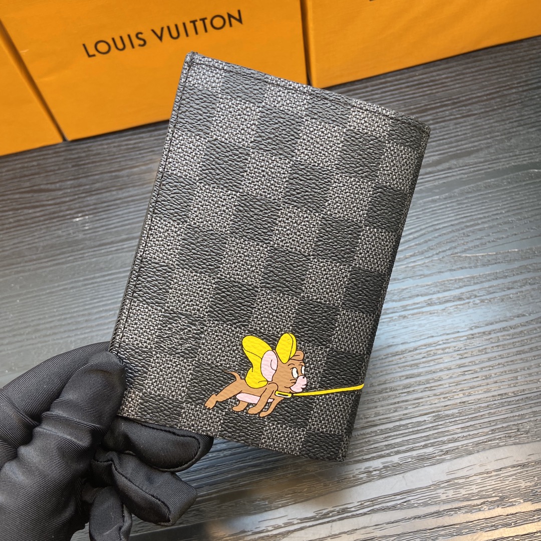 Assortment of leather passport holders in different colors.