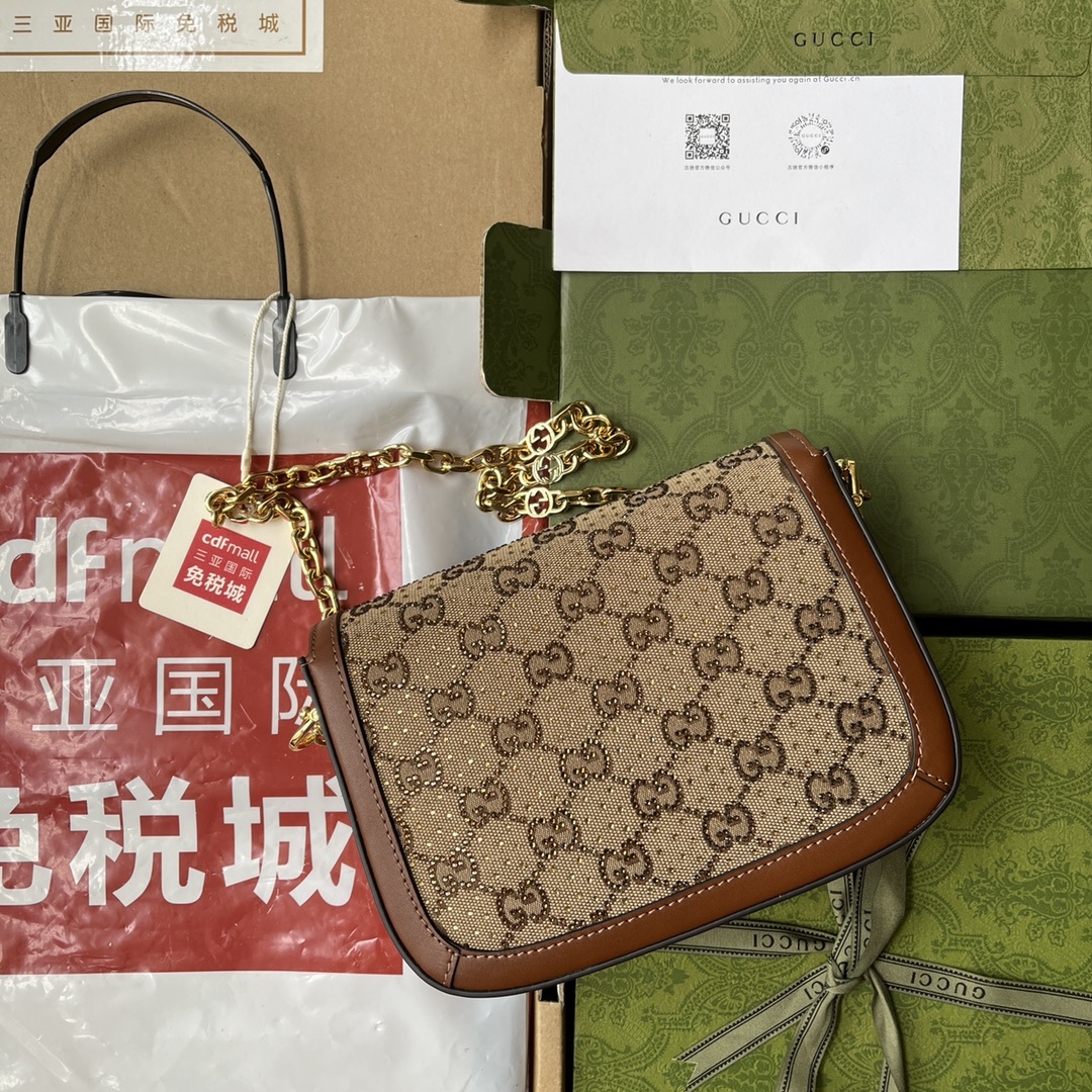 原厂皮配Cdfmall三亚免税店手提袋Horsebit1955的结构形状和干净的线条以珍贵的柔和银色蜥蜴