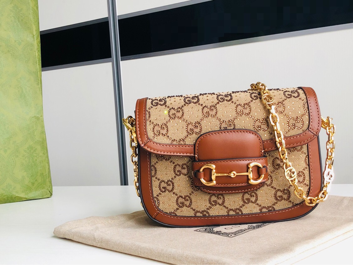 Gucci Double 11 Benefits 700 Copper Chain, Horsebit 1955's structural shape and clean lines are presented in precious diamonds and brown leather,