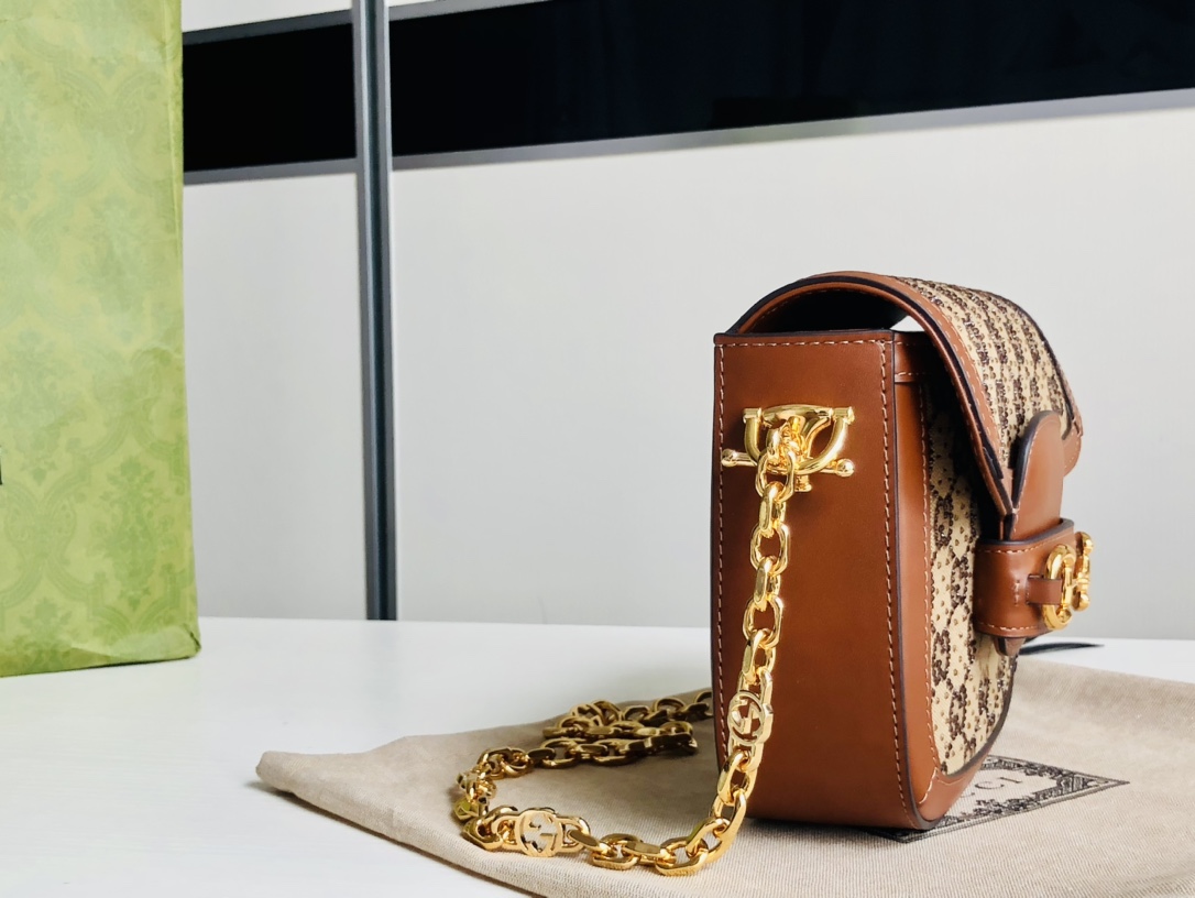 Gucci Double 11 Benefits 700 Copper Chain, Horsebit 1955's structural shape and clean lines are presented in precious diamonds and brown leather,