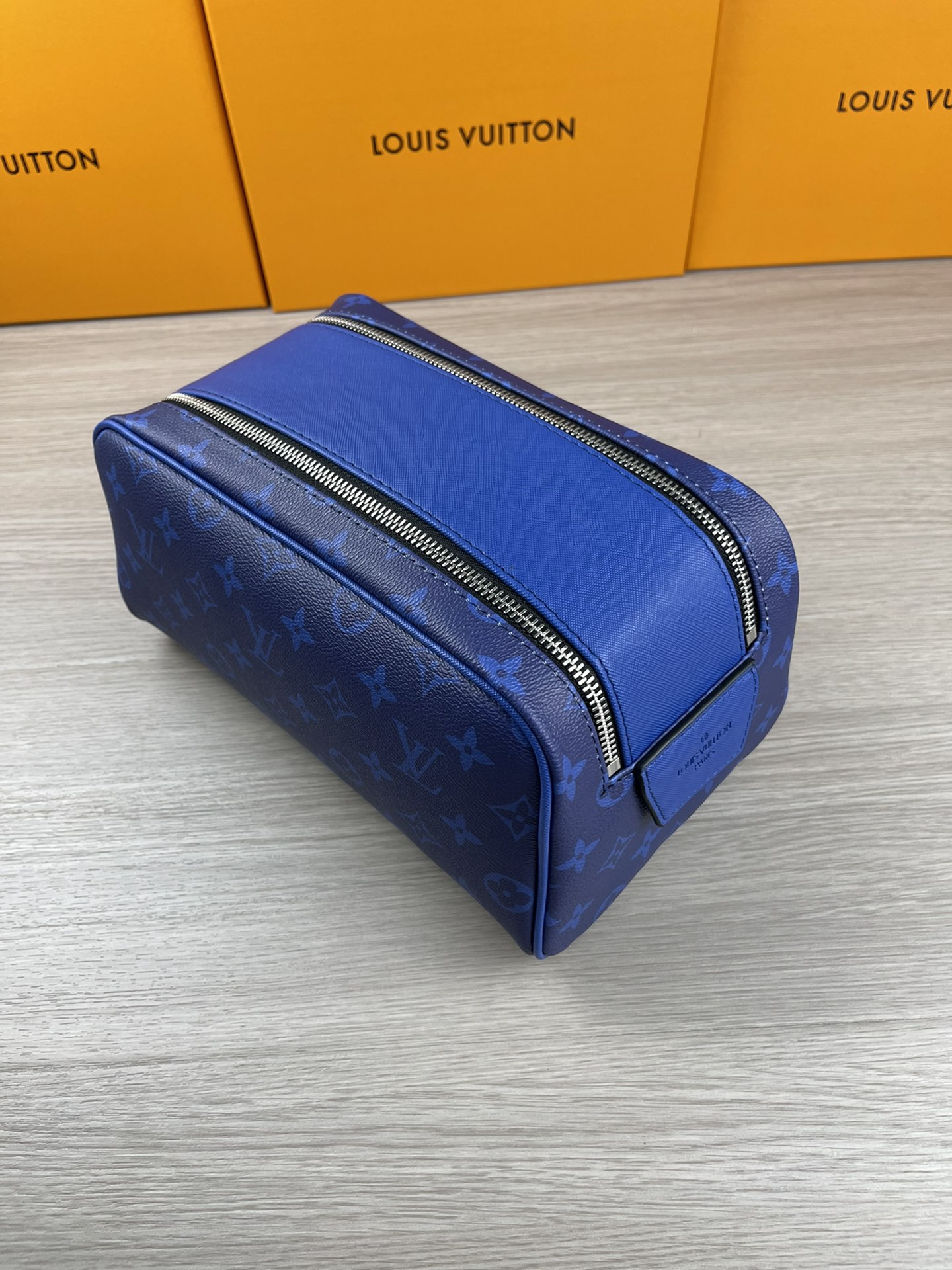 Blue Floral Cosmetic Bag M47528 - Open View, Large Capacity Blue floral cosmetic bag open with large capacity