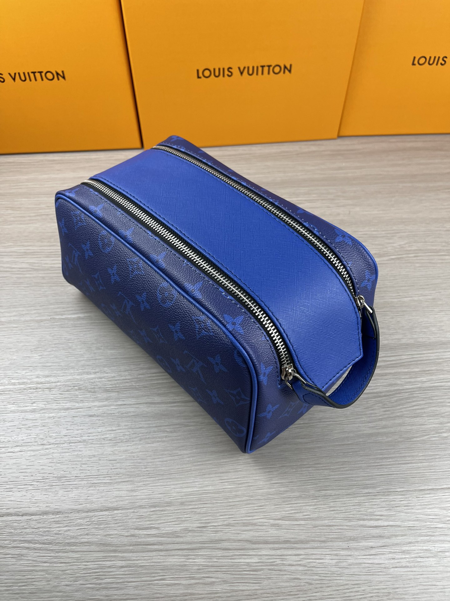 Blue floral canvas cosmetic bag exterior view