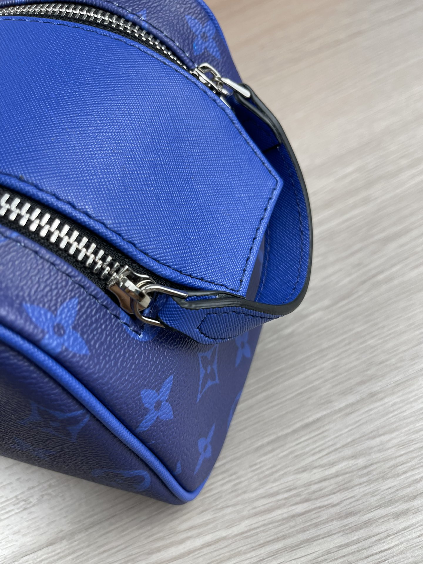 Blue Floral Cosmetic Bag M47528 - Multiple Angle View Blue floral cosmetic bag multiple angle view