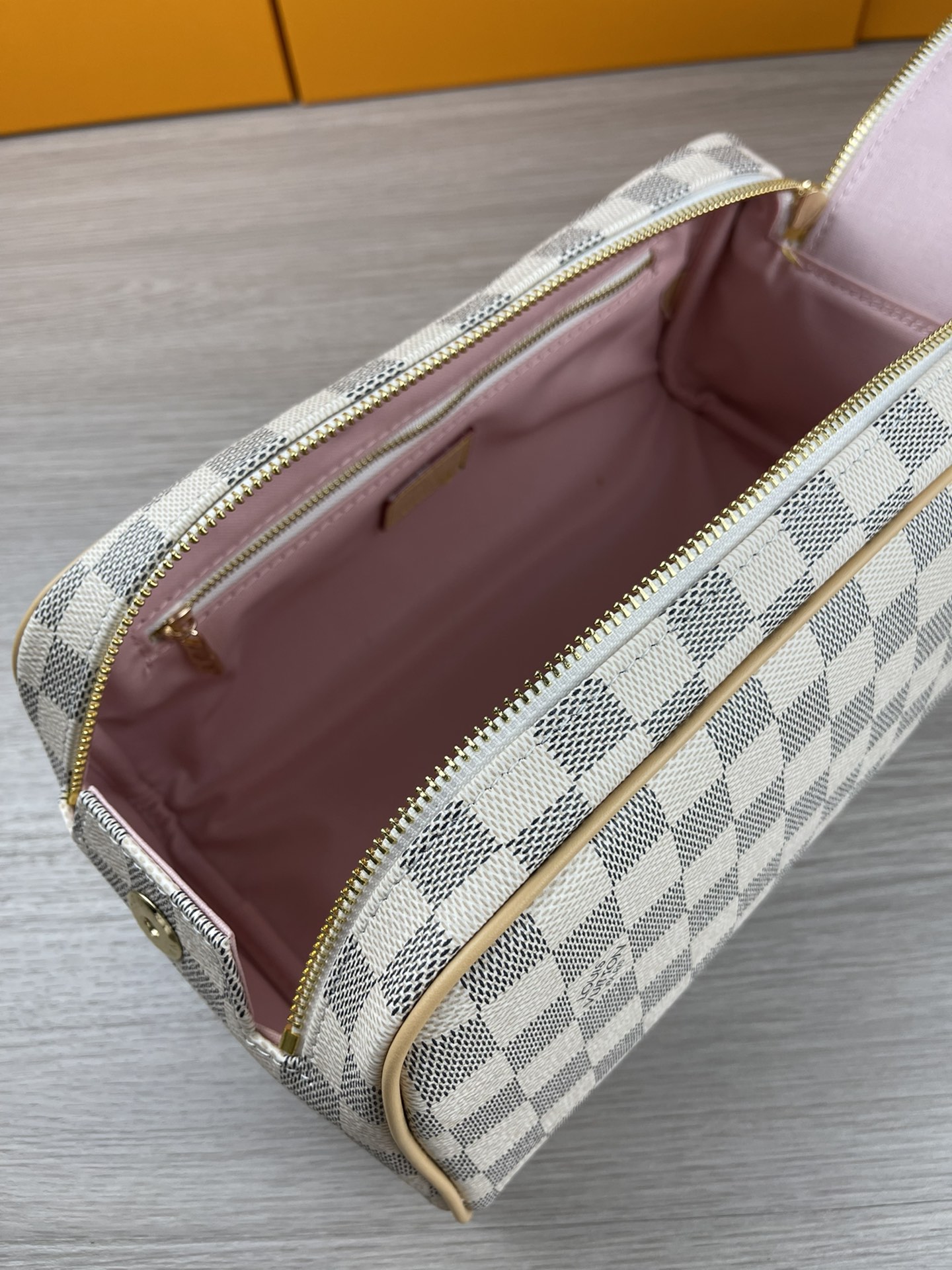 White Cosmetic Bag M47528 - Product in Use White cosmetic bag product in use