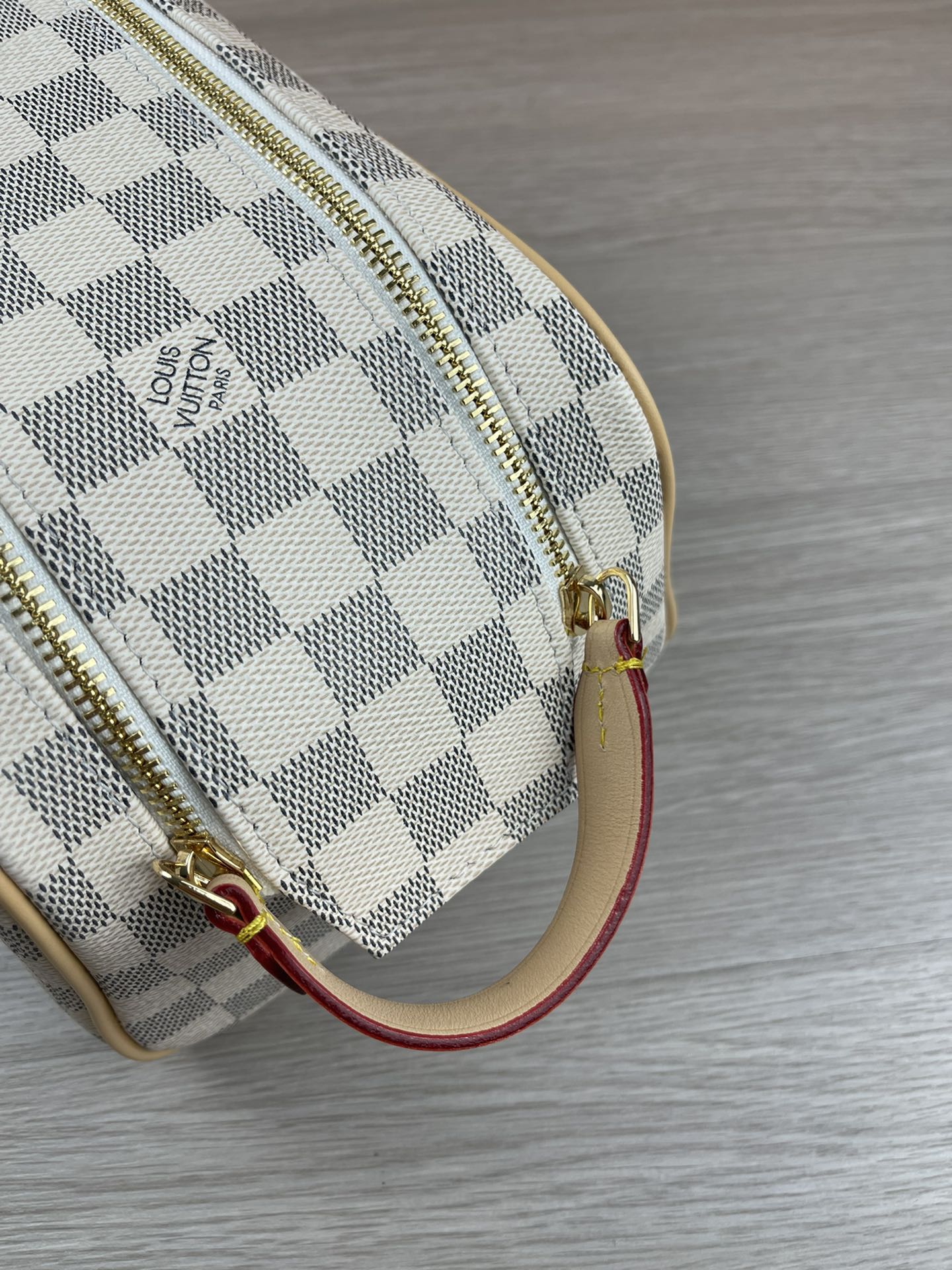 White Cosmetic Bag M47528 - Multiple Angle View White cosmetic bag multiple angle view