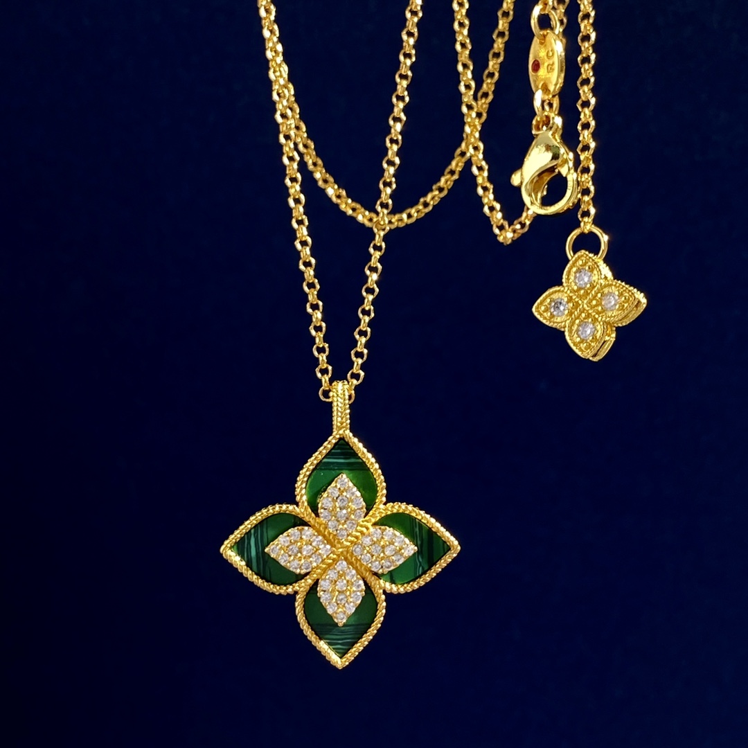 Roberto Coin Princess Flower necklace Yellow gold with white diamond accents available in mother-of-pearl and malachite stone variants 18 inches