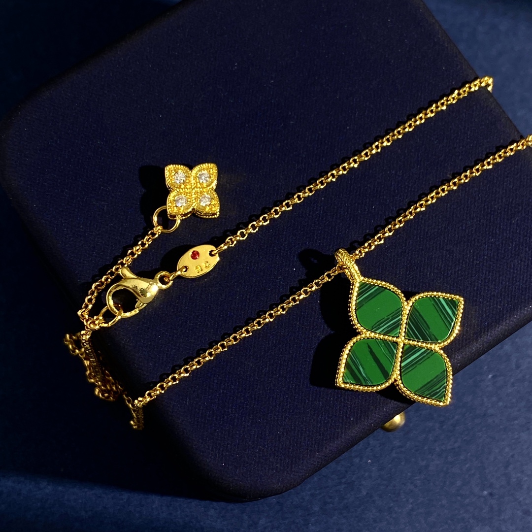 Roberto Coin Princess Flower necklace Yellow gold with white diamond accents available in mother-of-pearl and malachite stone variants 18 inches