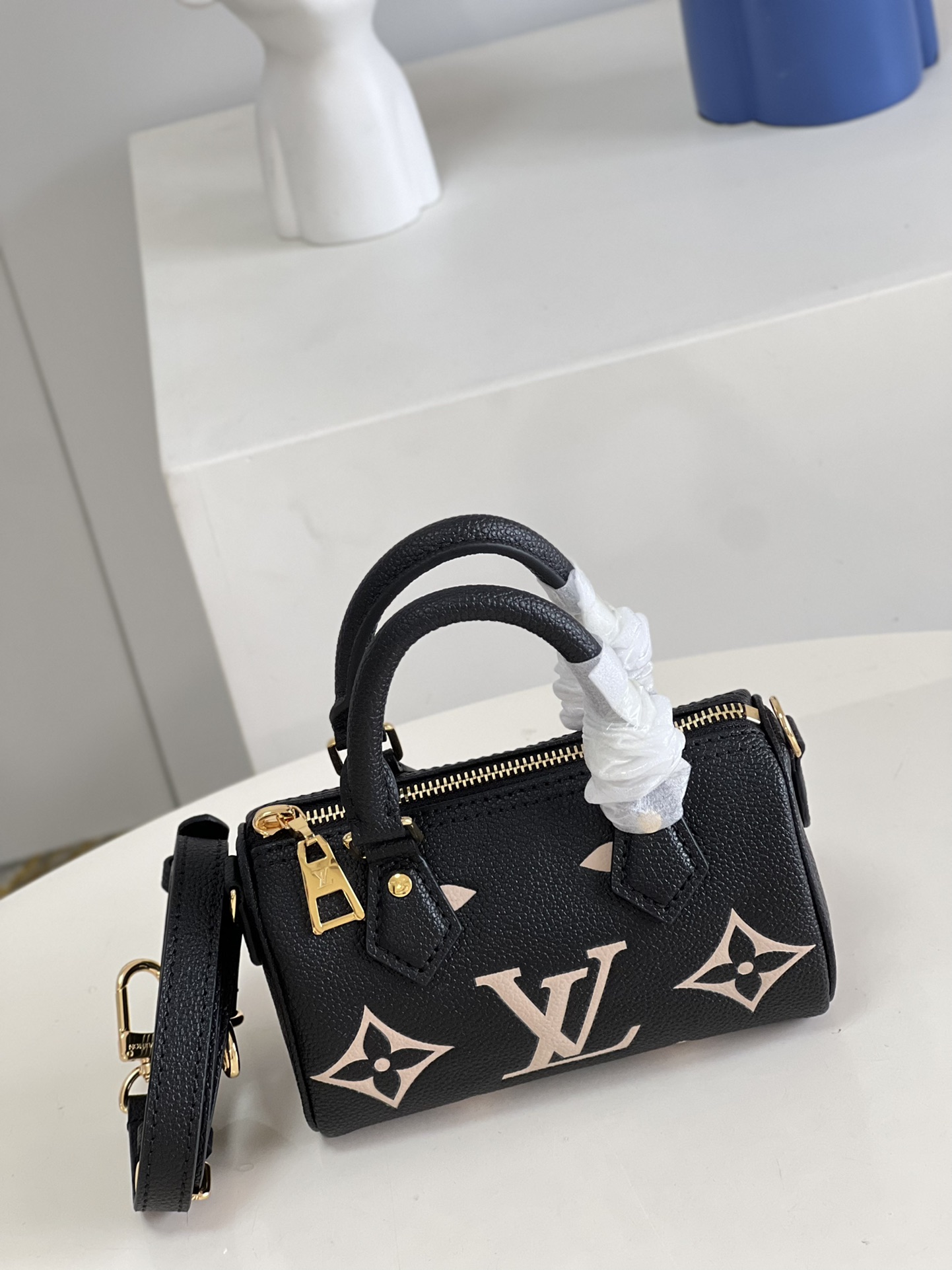 Louis Vuitton Nano Speedy: Mini Black Leather Satchel with Adjustable Strap 3 i1654937139 6834 1