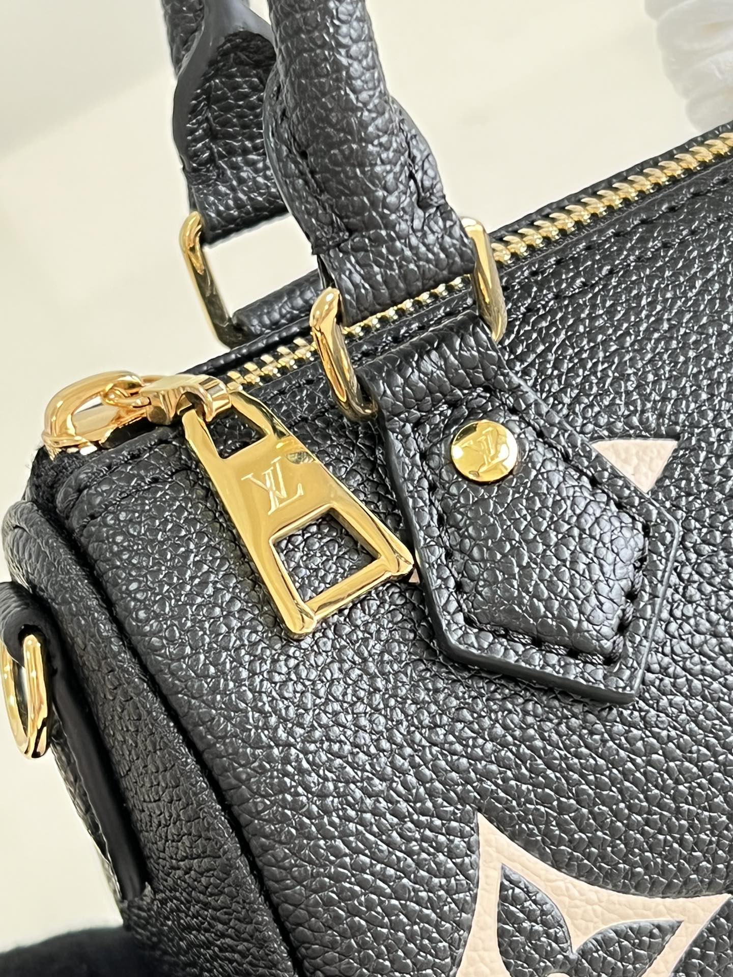 Louis Vuitton Nano Speedy: Mini Black Leather Satchel with Adjustable Strap 4 i1654937139 9605 2