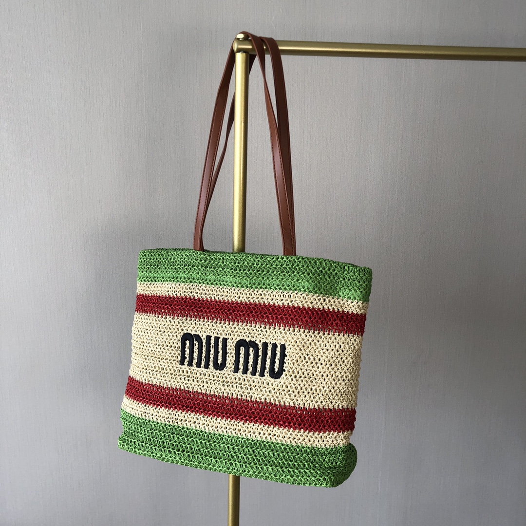 Crafted from woven natural raffia, this vintage-inspired tote bag - Comprehensive 2