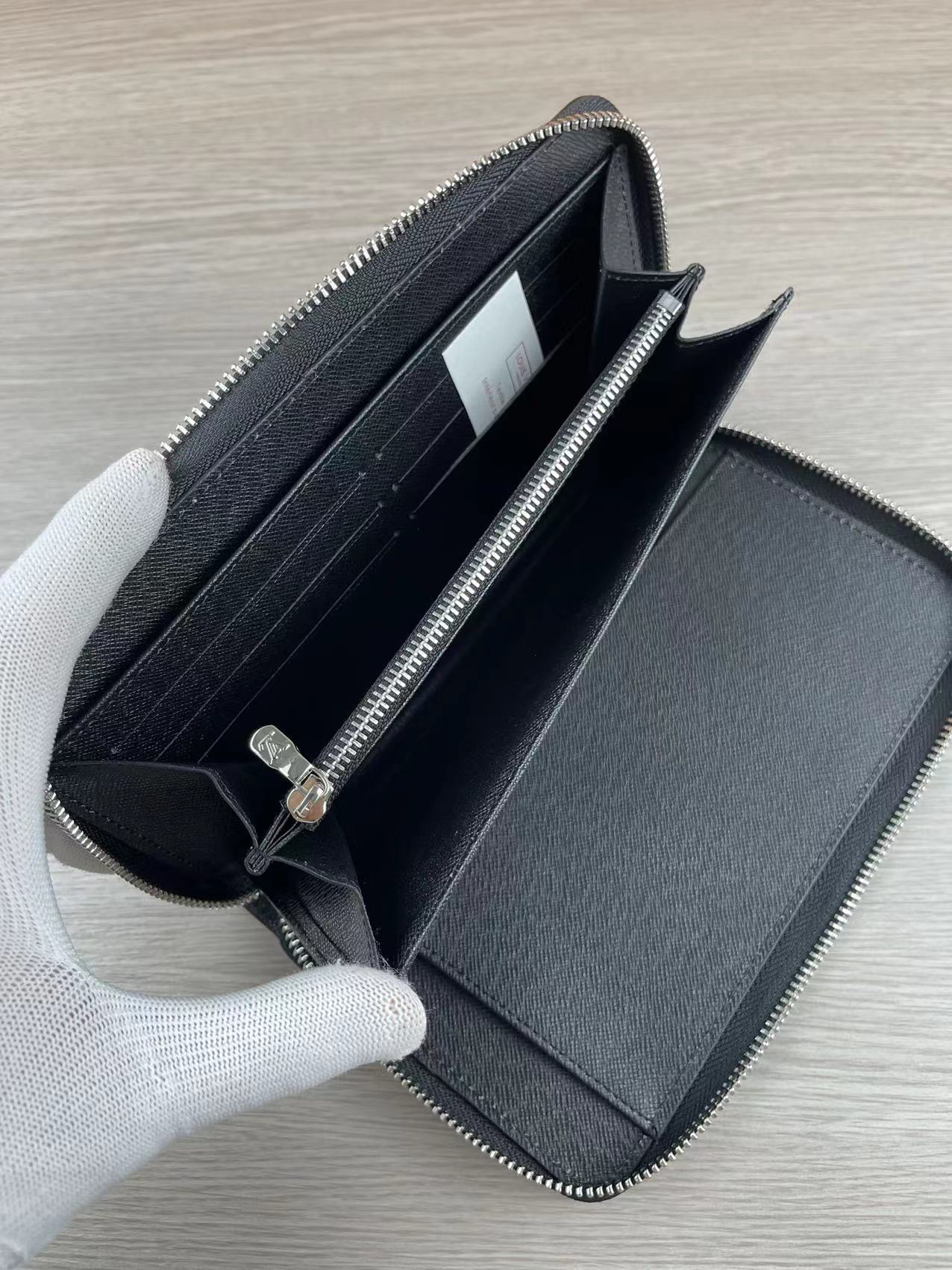 Different angle of the leather zip around wallet