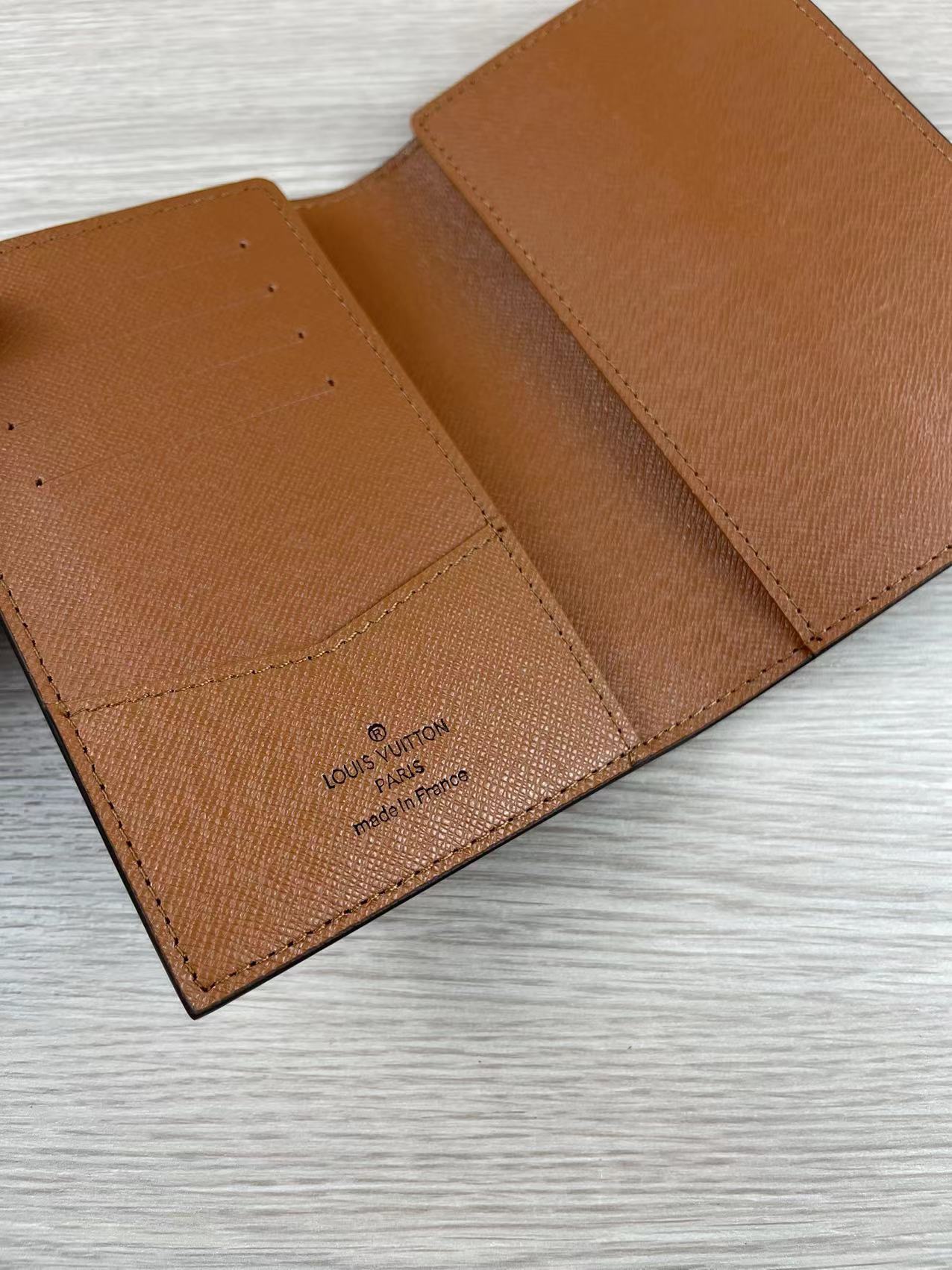 Leather passport holder in use
