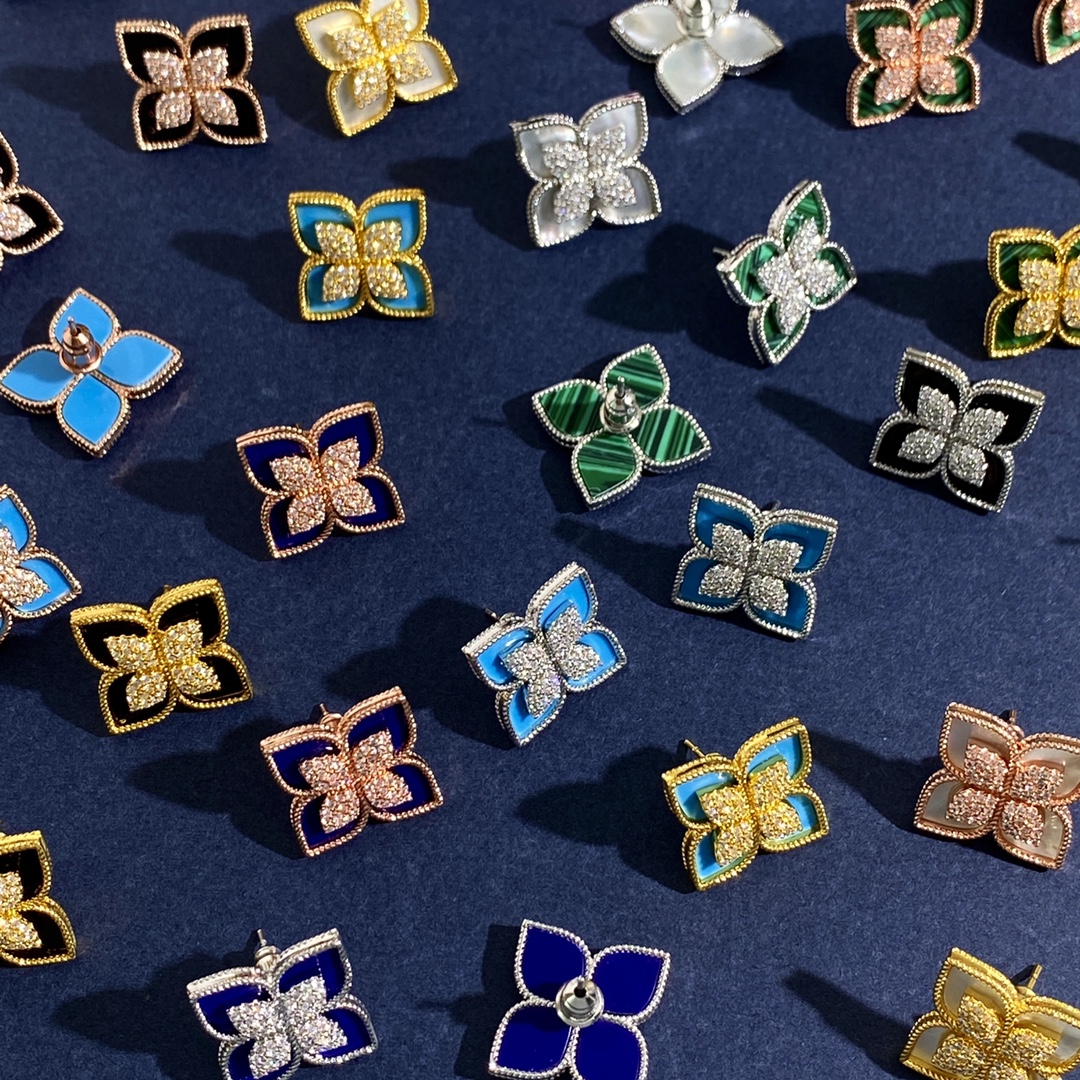 Roberto Coin Princess Flower earrings Available in rose gold yellow gold and white gold metal options with center pave diamonds and inlay options of white mother-of-pearl blue lapis lazuli turquoise green malachite and black onyx 15mm stud diameter