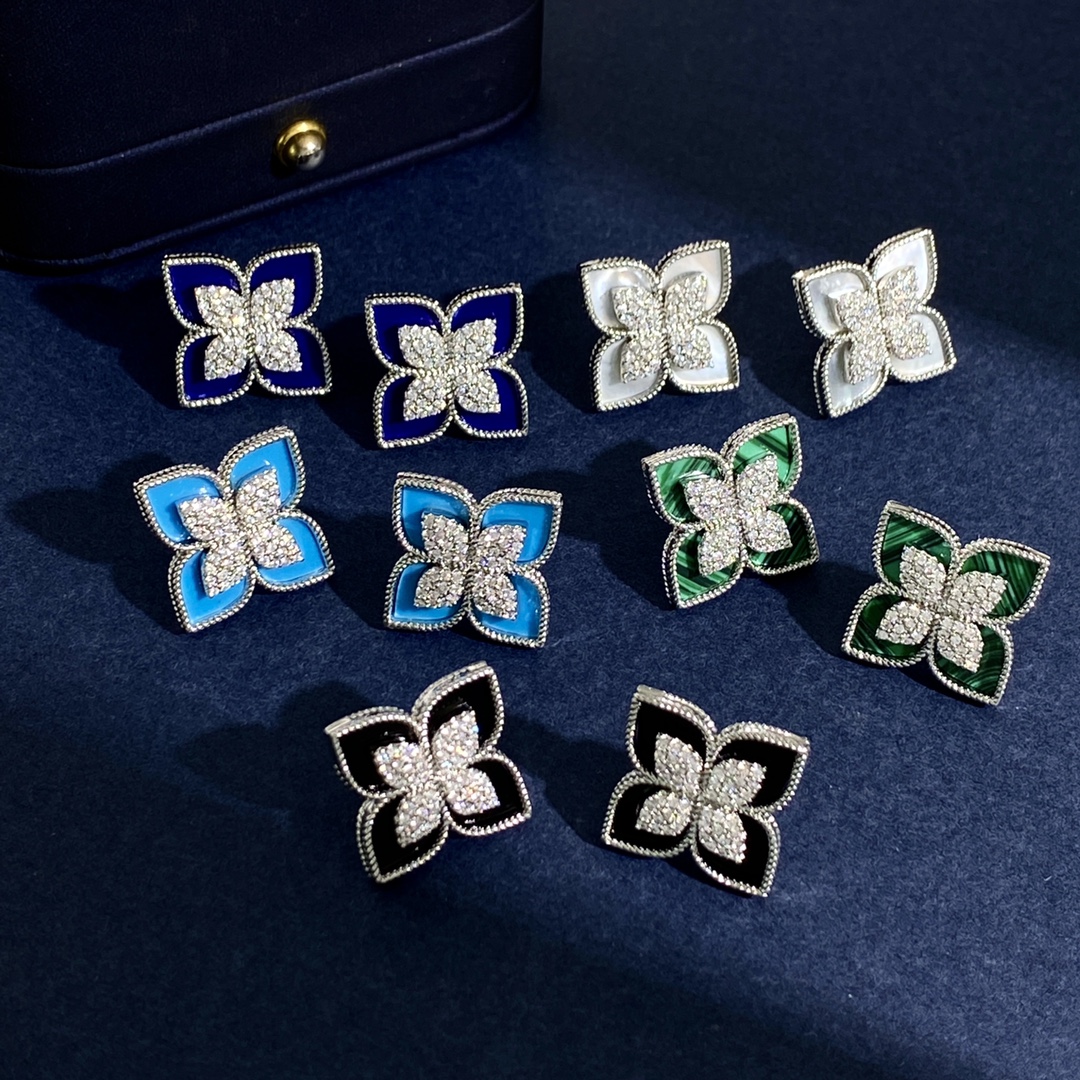 Roberto Coin Princess Flower earrings Available in rose gold yellow gold and white gold metal options with center pave diamonds and inlay options of white mother-of-pearl blue lapis lazuli turquoise green malachite and black onyx 15mm stud diameter