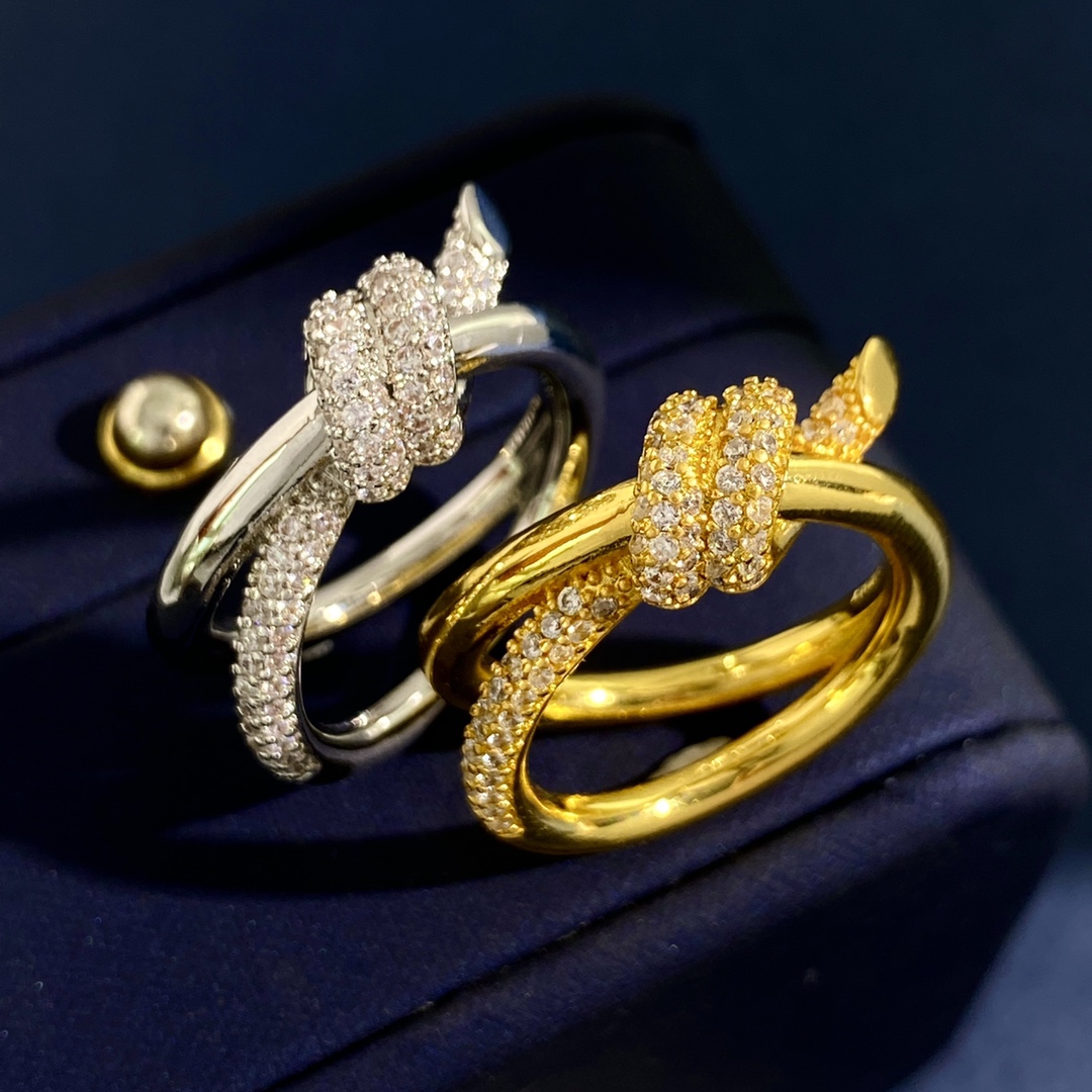 Tiffany Knot ring Yellow gold with clear diamond pave accents US 7