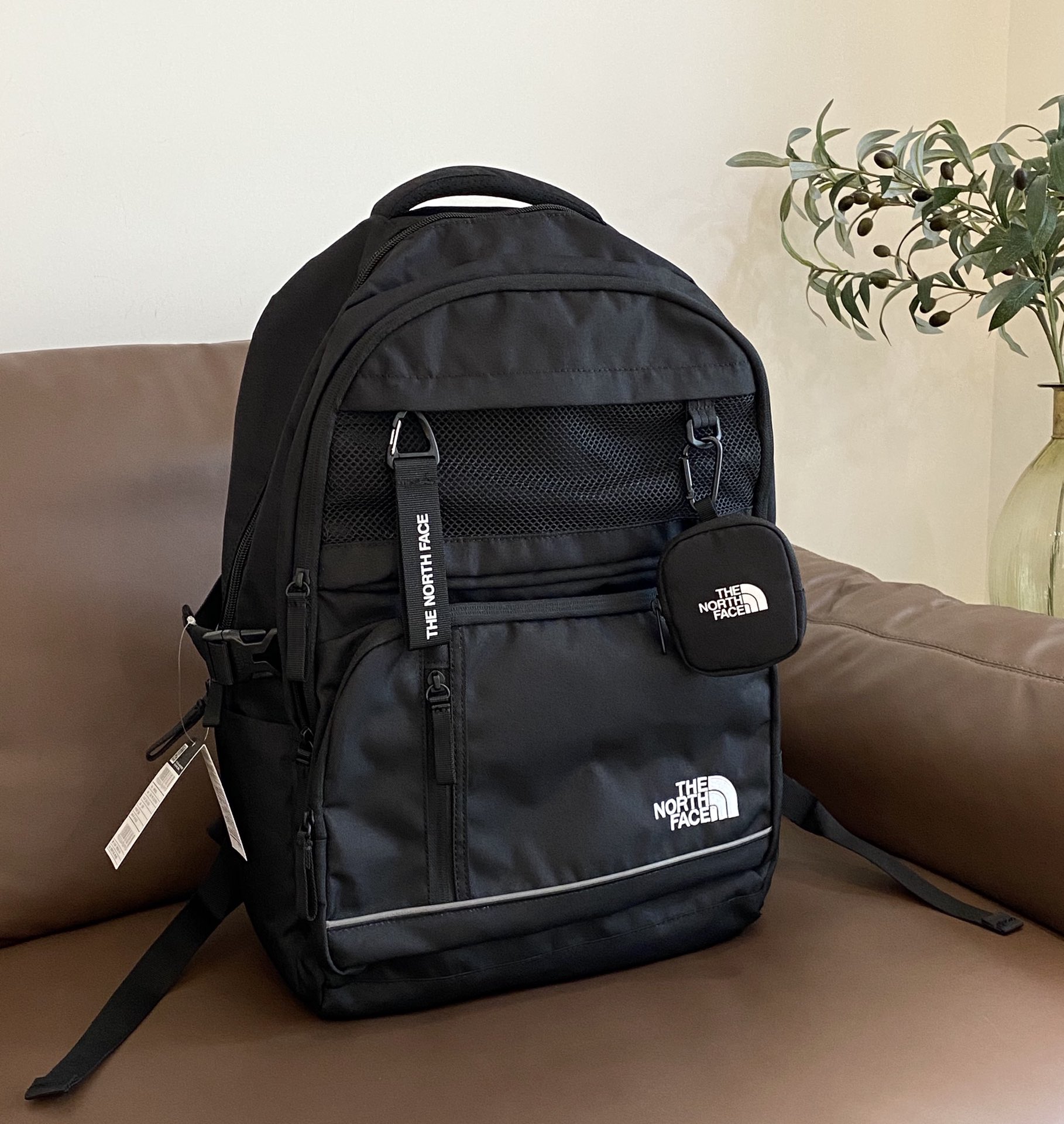 This functional backpack features a spacious capacity with - Comprehensive 3