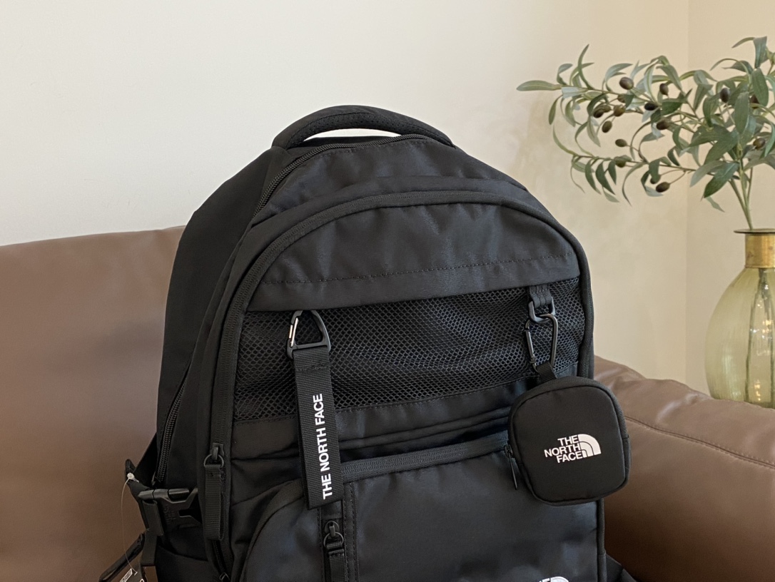 This functional backpack features a spacious capacity with - Comprehensive 5