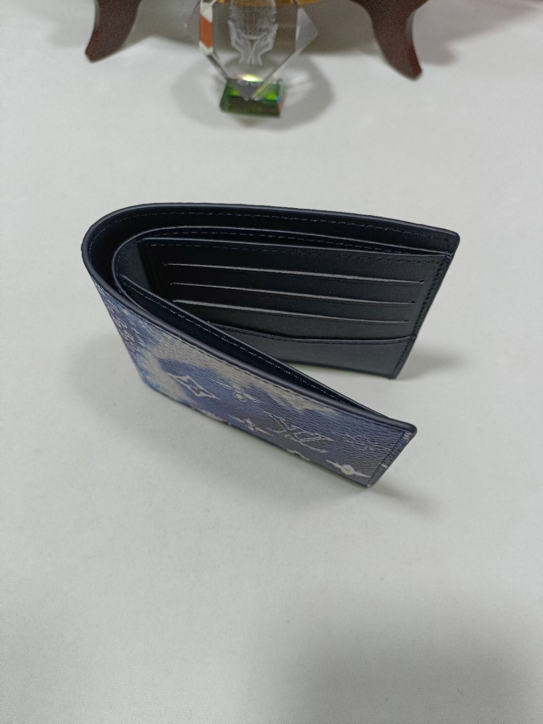 Close-up of the stitching detail on the leather bifold wallet