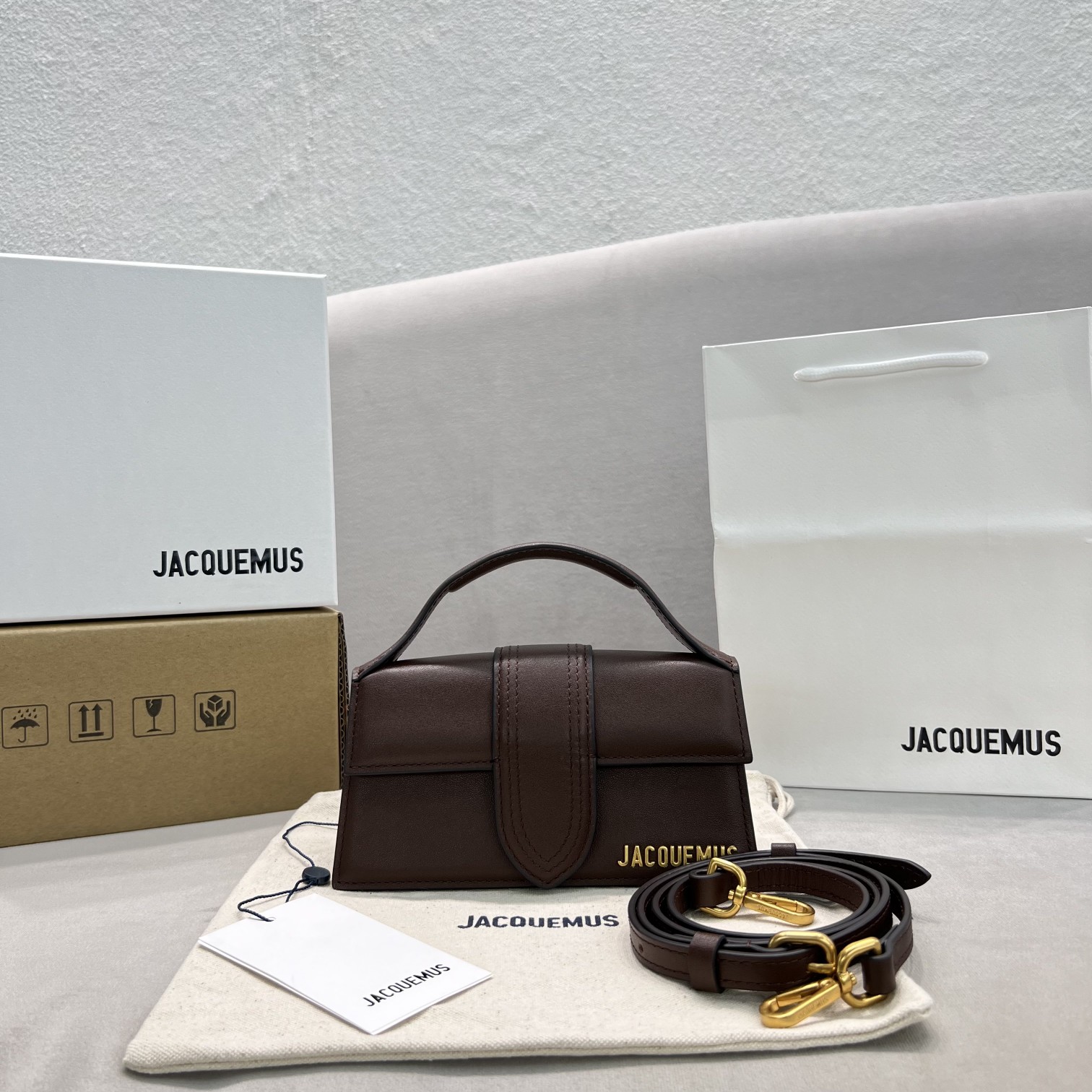 Jacquemus AAAA
 Crossbody & Shoulder Bags Chocolate color Gold Chamois Fall/Winter Collection Mini