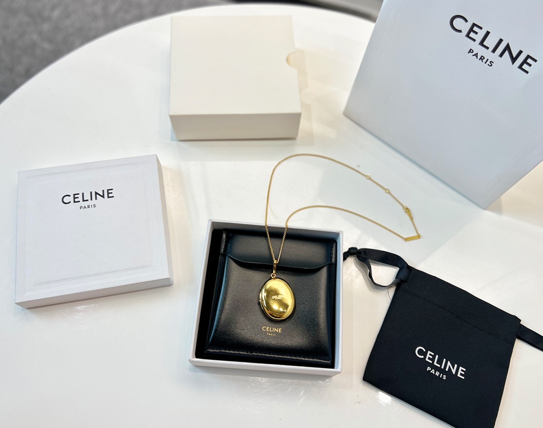 Celine赛琳金色椭圆双面镜子项链