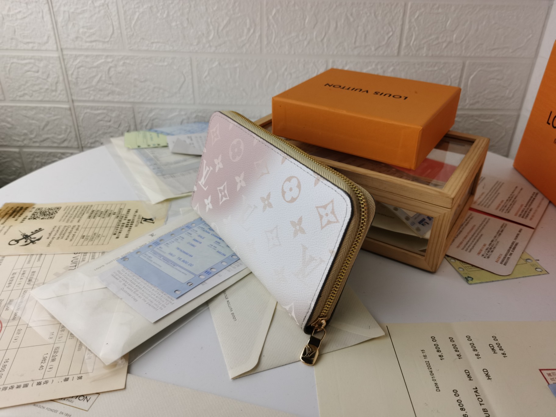 ラグジュアリーなモノグラム帆布のラウンドジップ財布