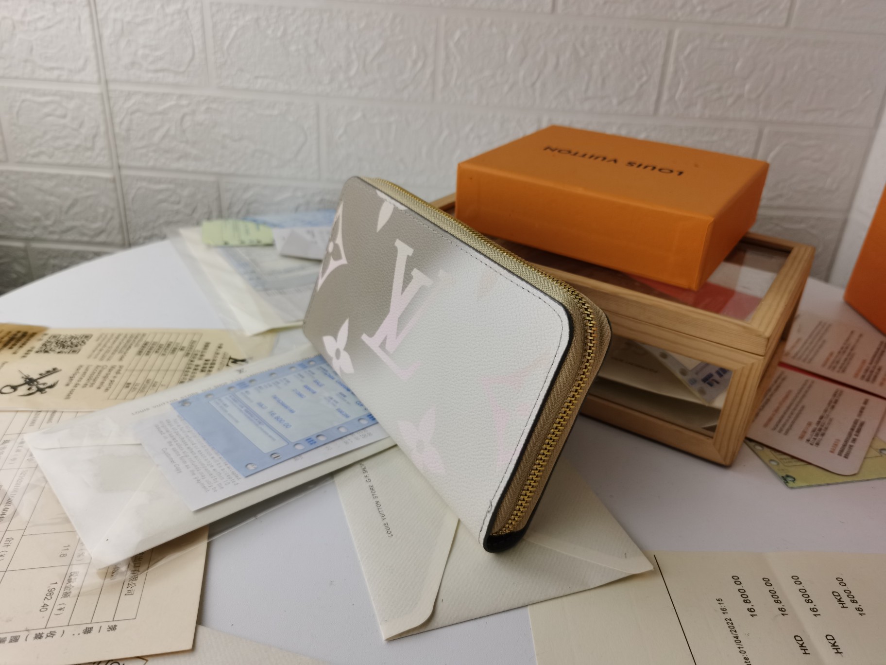 ラグジュアリーなモノグラム帆布のラウンドジップ財布