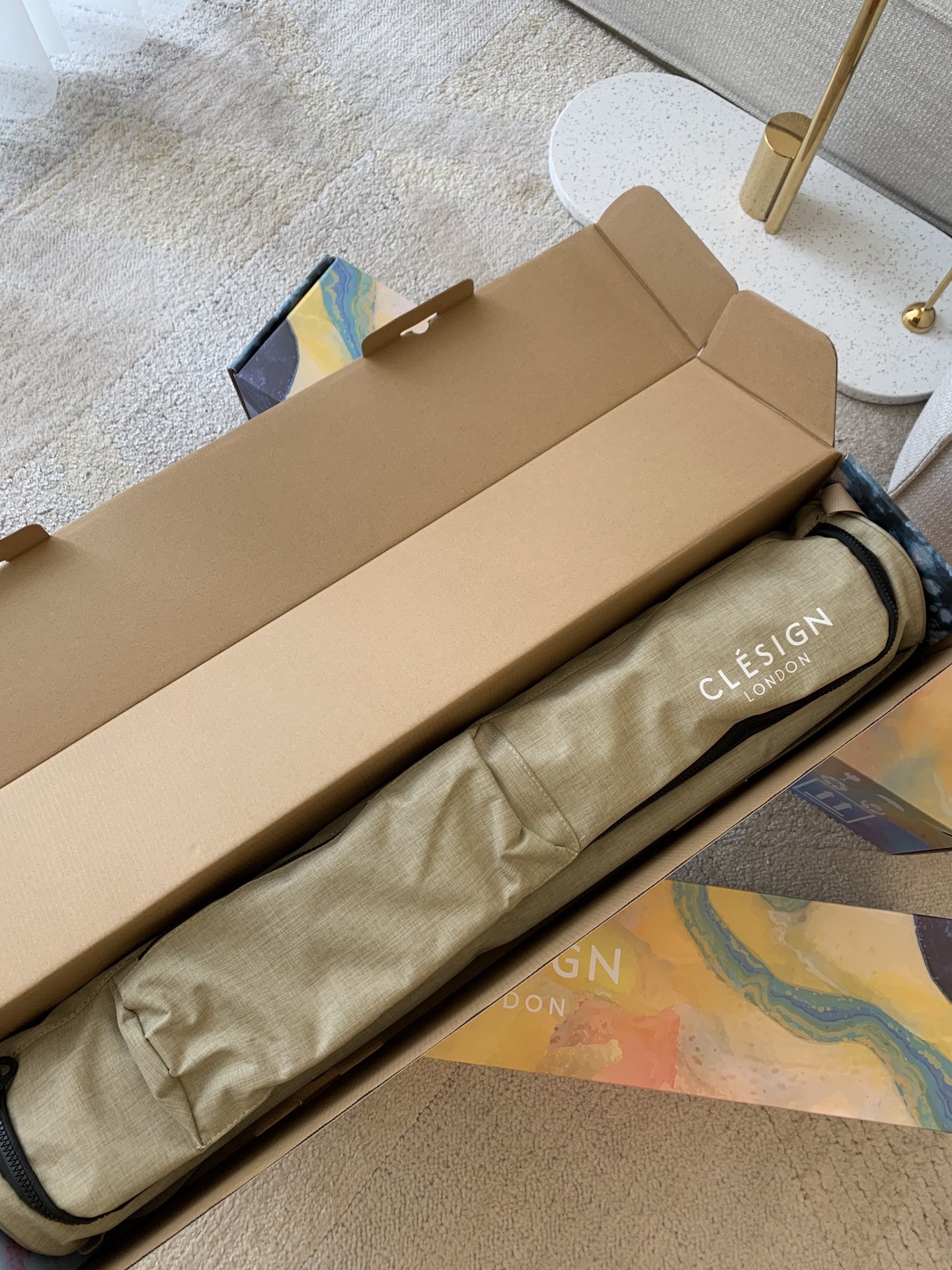 An outdoor-ready yoga carry bag featuring signature logo-engraved zipper - Comprehensive