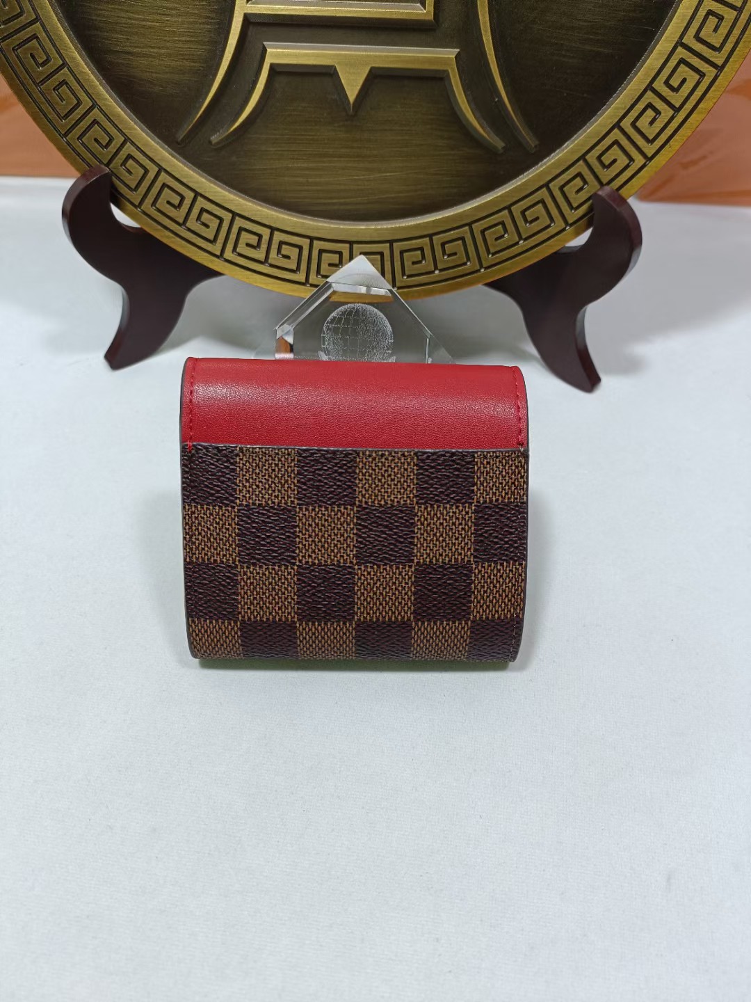 Open view of a premium leather bifold wallet showing card slots