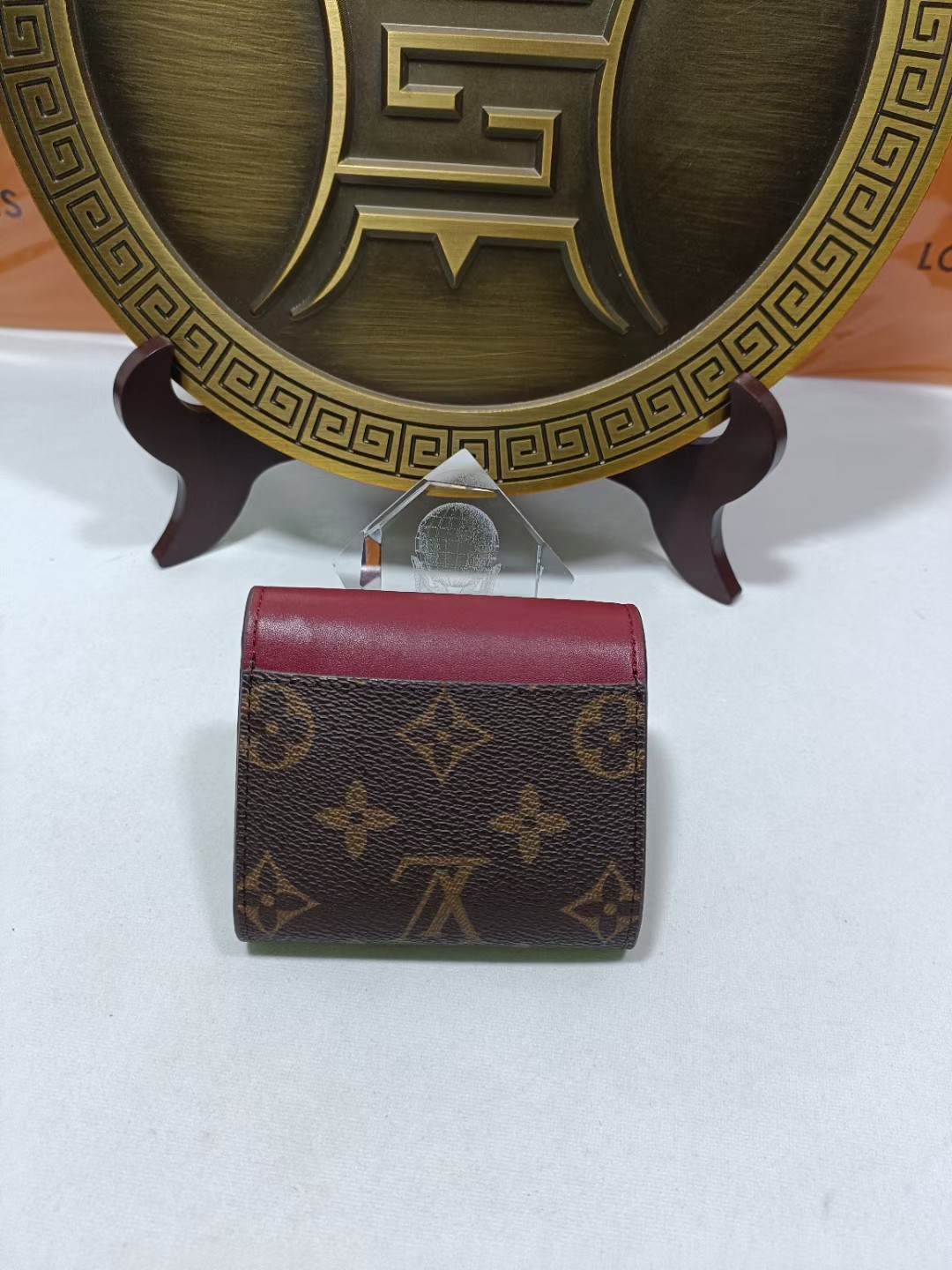 Open view of a premium leather bifold wallet showing card slots