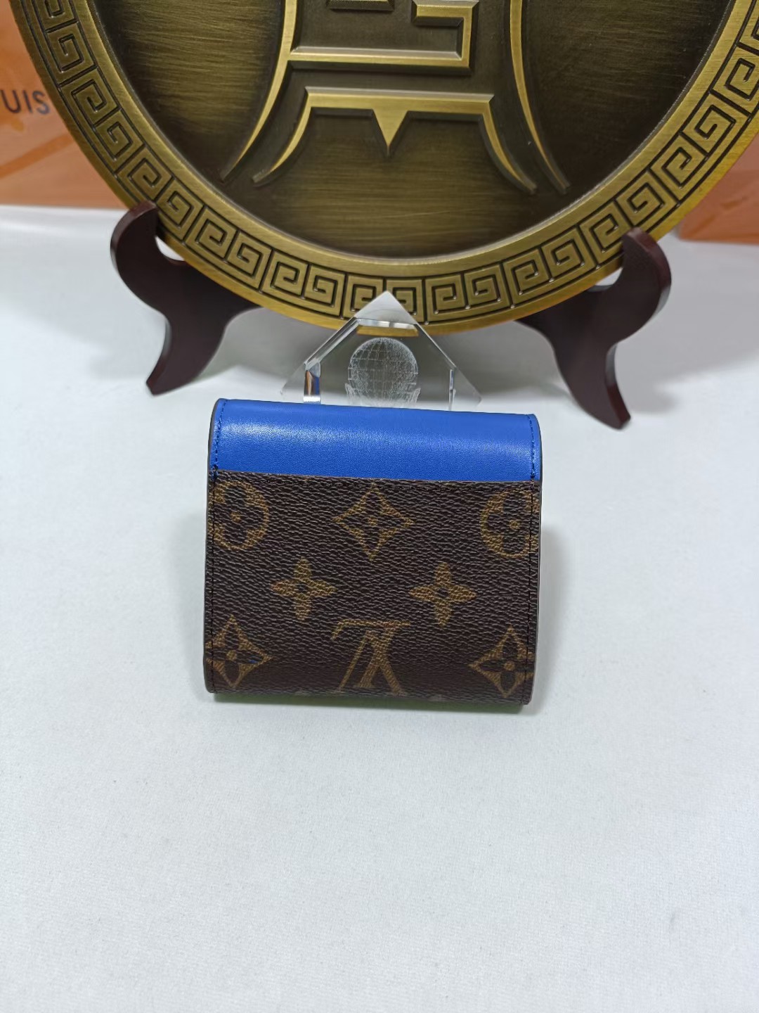 Bifold leather wallet open, showing card slots