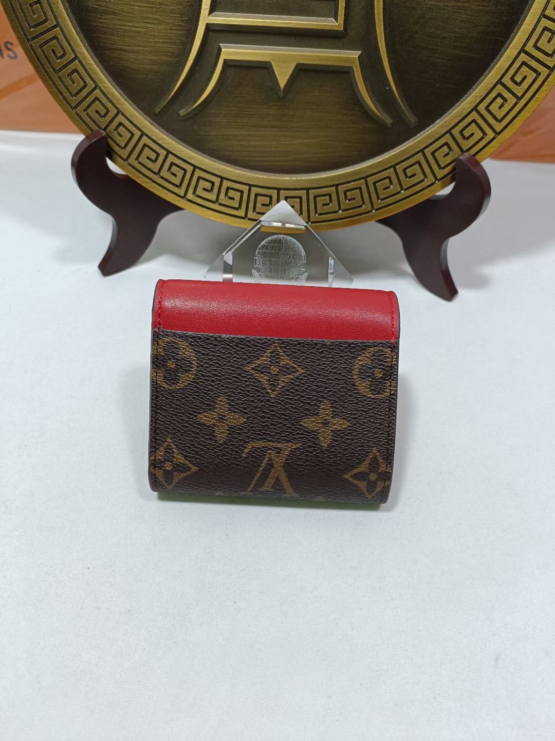 Bifold leather wallet open, showing card slots