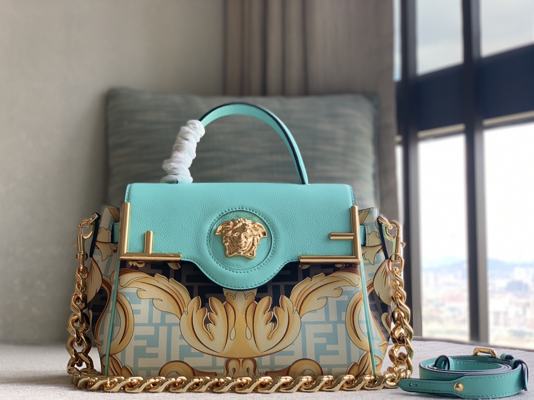 Fendi The Versace by FEND1 series handbags, the design of the iconic LaMedusa handbag, reinterprets the Fendace Gold Baroque print, decorated wit