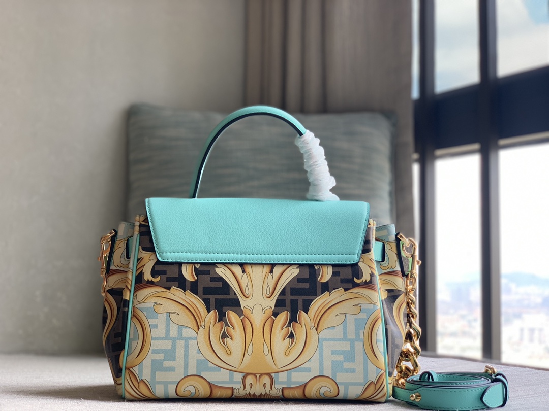 Fendi The Versace by FEND1 series handbags, the design of the iconic LaMedusa handbag, reinterprets the Fendace Gold Baroque print, decorated wit